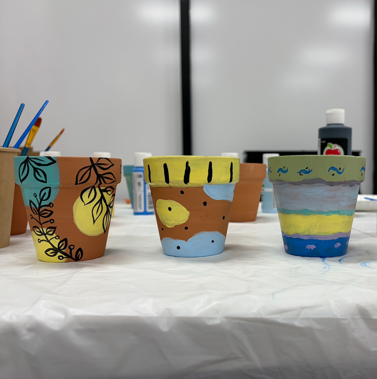 Event attendees' finished art projects