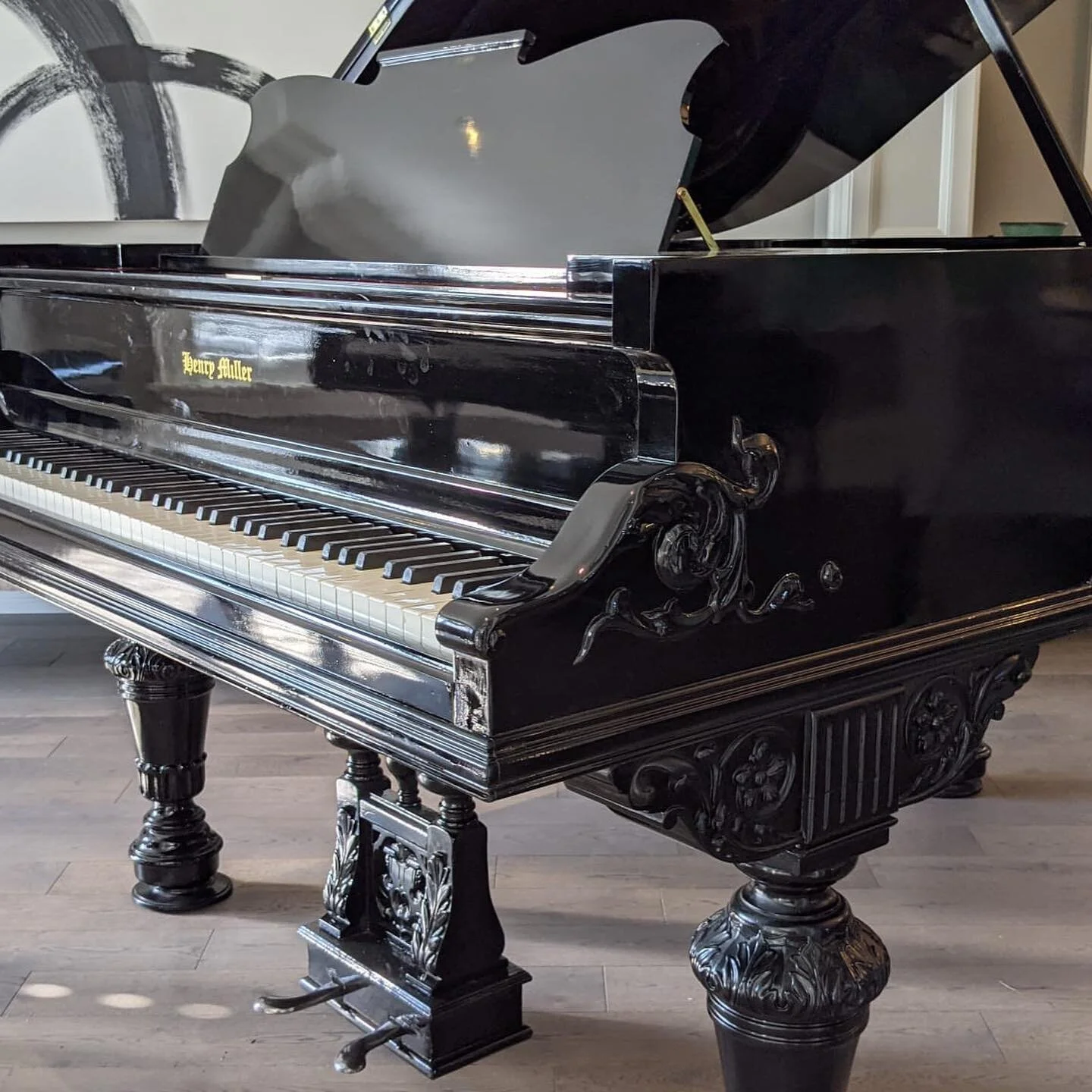 ⭐️FOR SALE⭐️ This stunning Henry Miller is as beautiful as they come. It's a unique showpiece that will make your space look gorgeous. This 5'8" baby grand piano was refinished in high-gloss black, and it shines like a diamond. It has a wonderfu