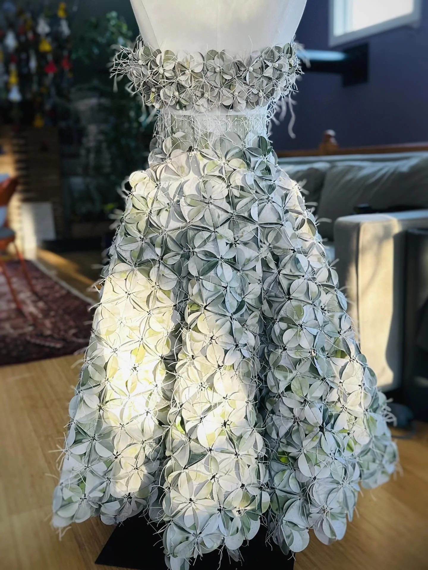 In the late afternoon winter light&hellip;she stands. Waiting.
#workinprogress #photographyreimagined #papersculpture #paperdresses #vermontartist