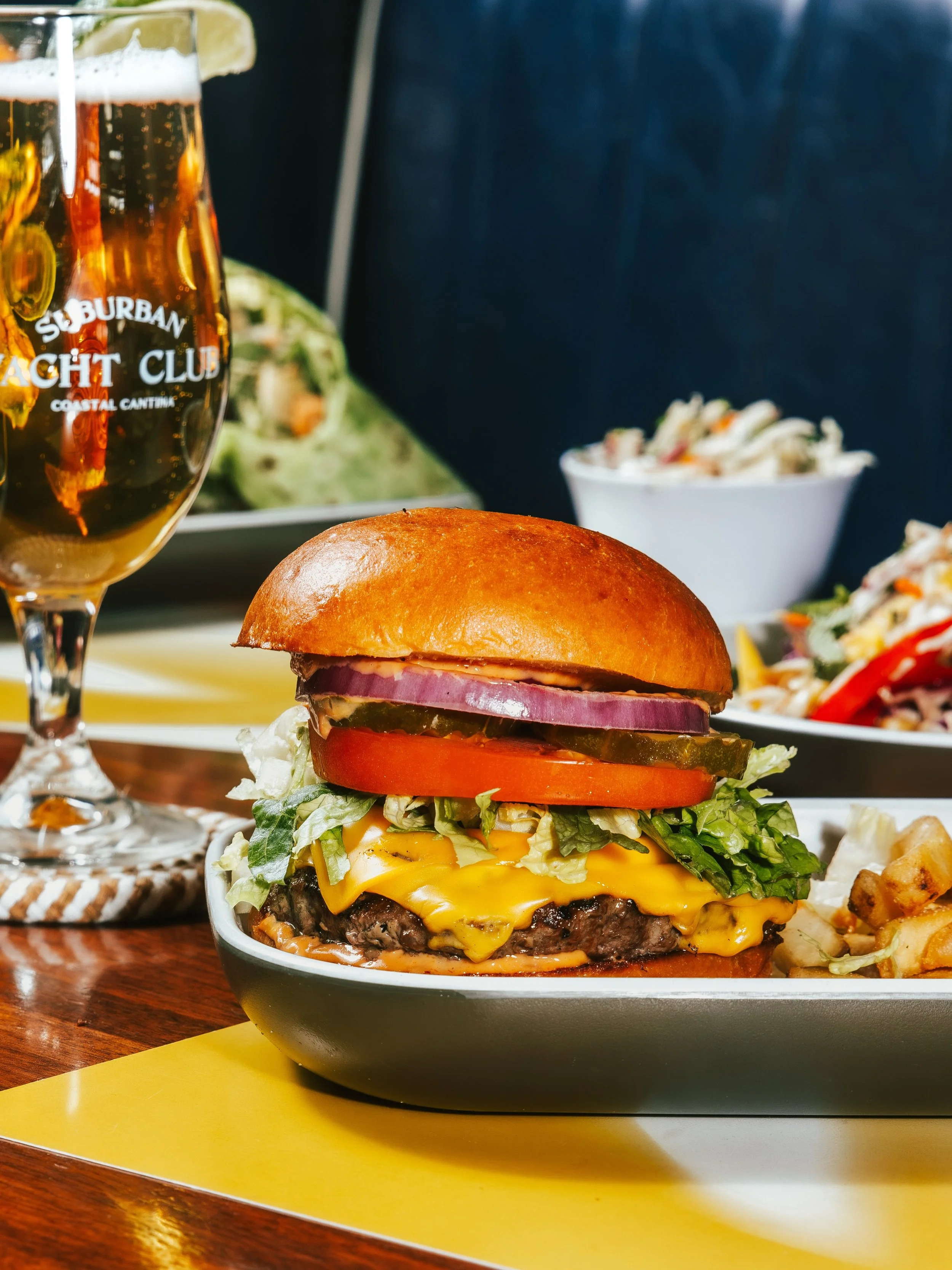 Some cravings are negotiable. This isn&rsquo;t one of them. The Beach Burger: &frac12; lb beef patty, melty American cheese, all the classic fixings, and a fancy sauce we take very seriously. Find it at Suburban Yacht Club in Plano.

#PlanoEats #Plan