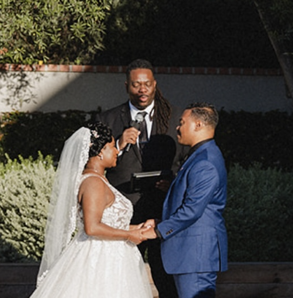 Wedding Officiant Chris Dickens of Your Custom Ceremony presiding over a wedding at The Harper in Costa Mesa, CA.