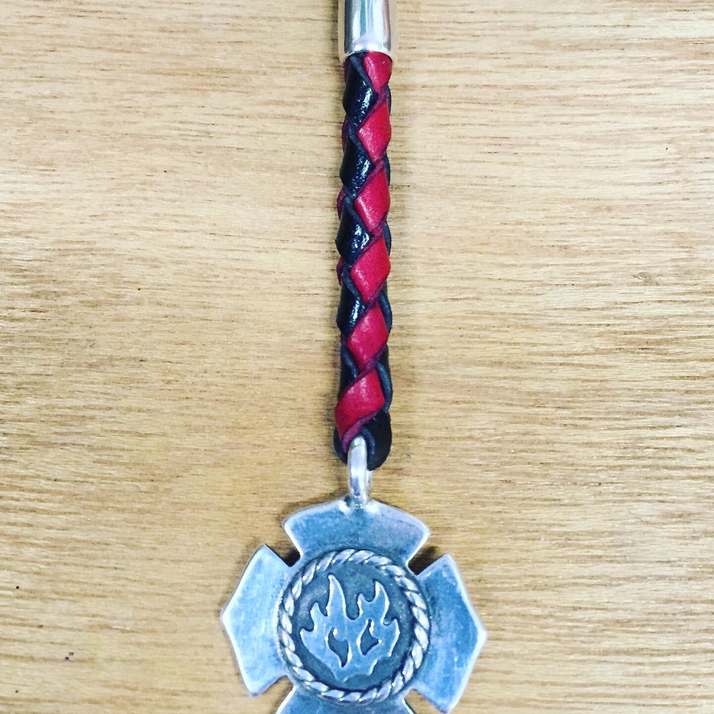 Thank you Firefighters! The sterling silver pendant also makes a beautiful key ring. Exquisitely hand braided with your choice of a wide variety of leather colors. 

#gallantry #sympathy #tact #observation #perserverance #loyalty #dexterity #explicit