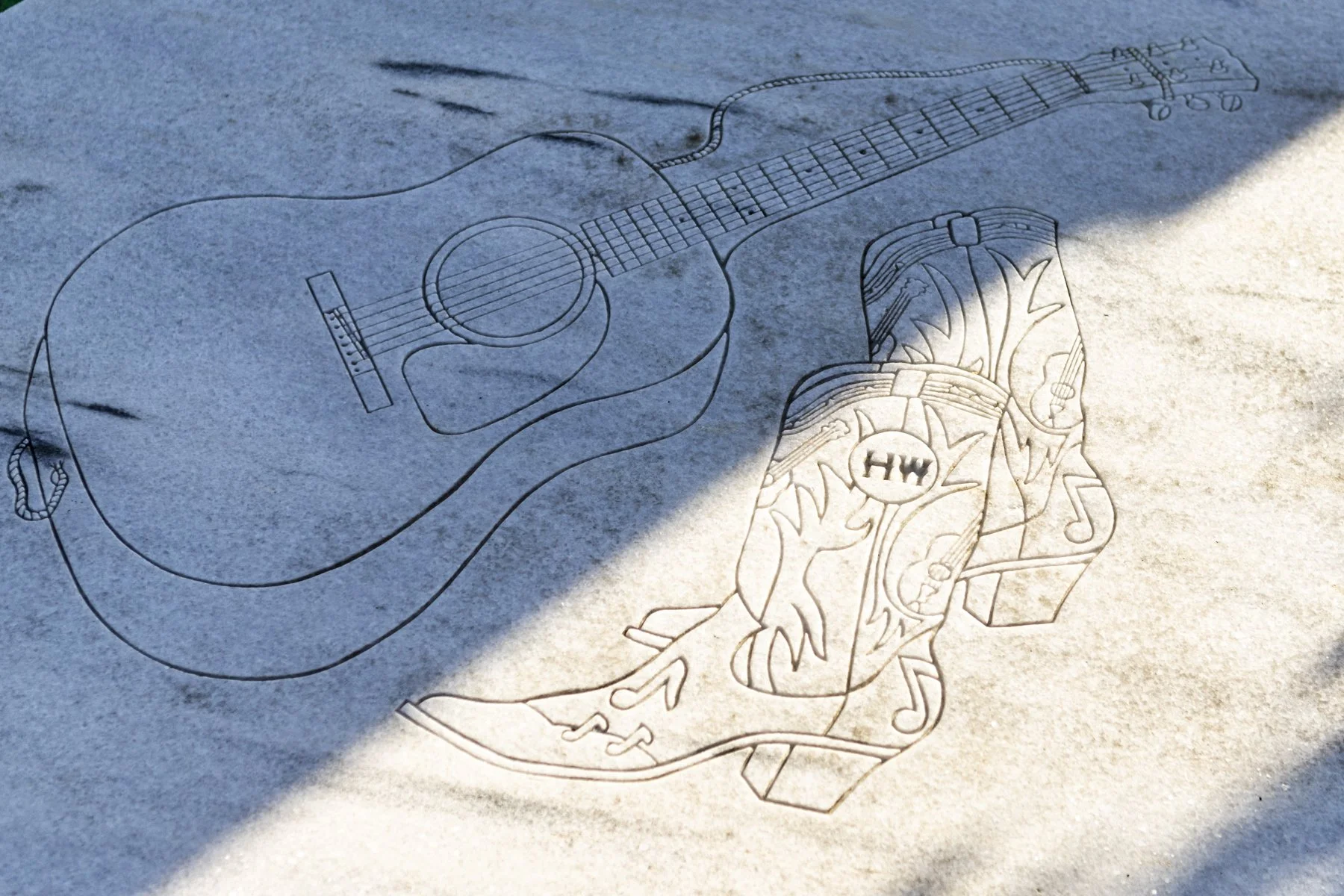 The etching on the grave cover.  Audrey's cover had a matching design.