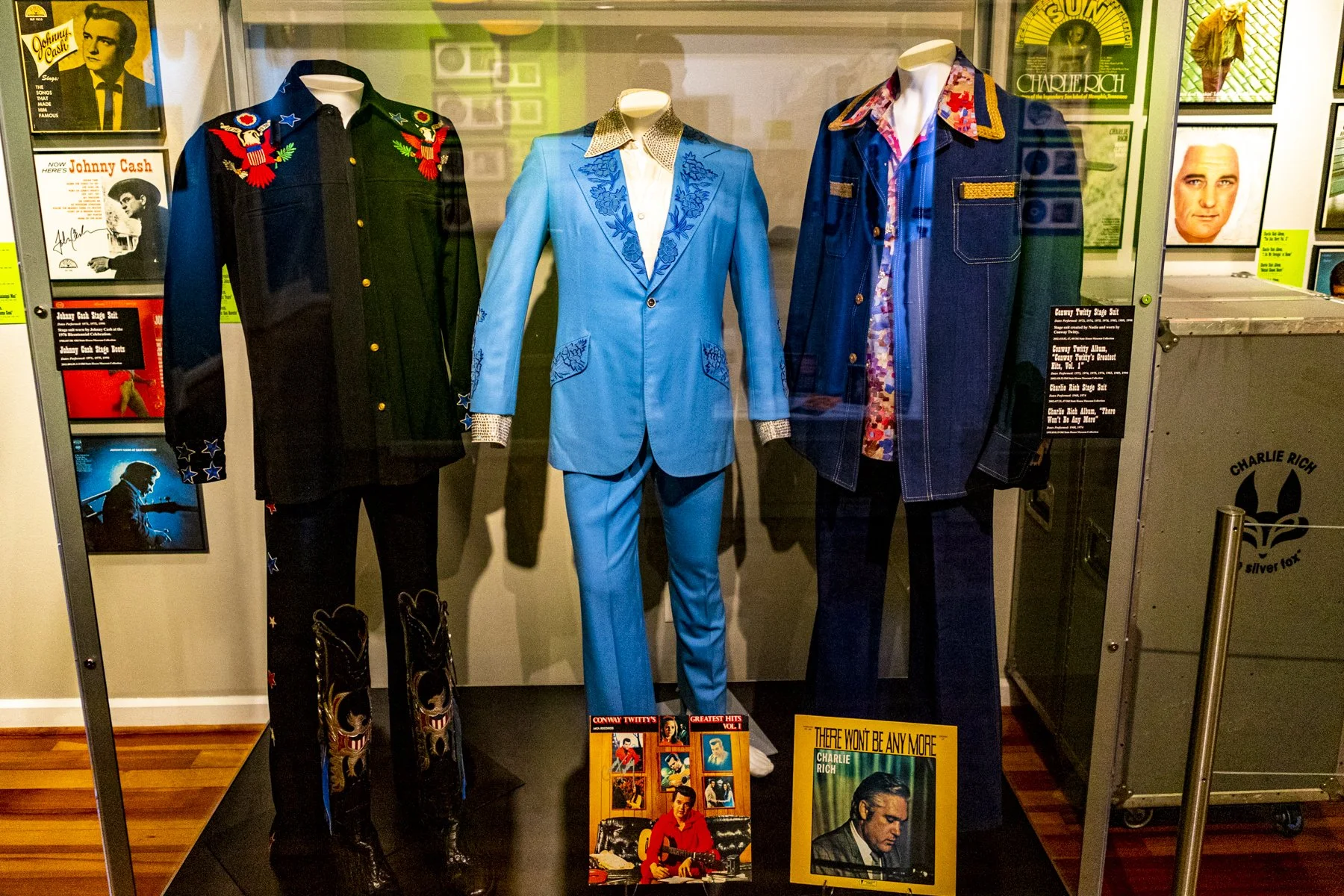 Stage suits of Johnny Cash, Conway Twitty, and Charlie Rich.