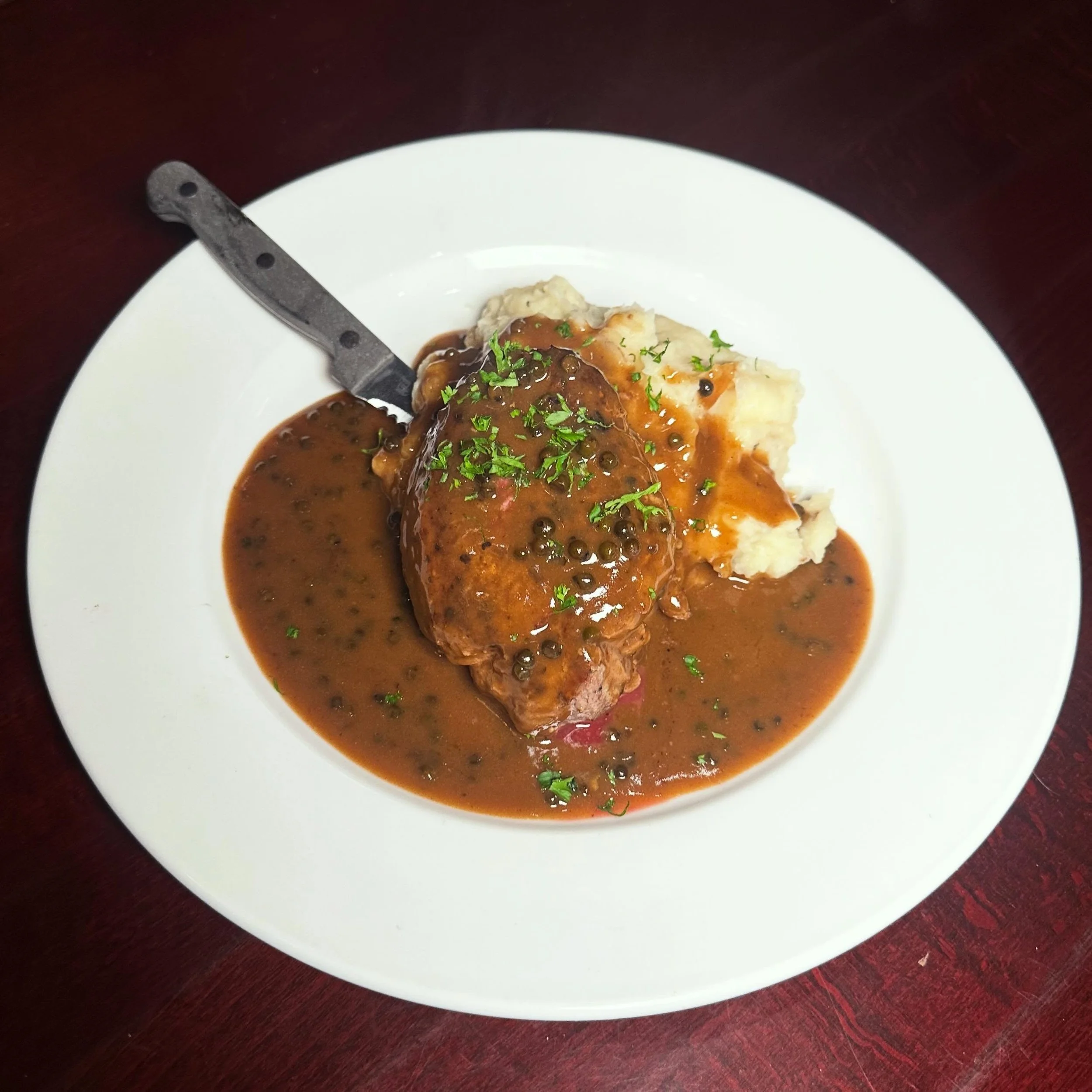 Steak au Poivre of our dreams🤤
.
.
Black peppercorn crusted filet mignon and creamy mashed potatoes topped with a brandied peppercorn sauce.
Served 4pm-930pm Wednesday through Sunday!
.
.
 #themerc #themercsaratoga #downtownsaratoga #saratogasprings