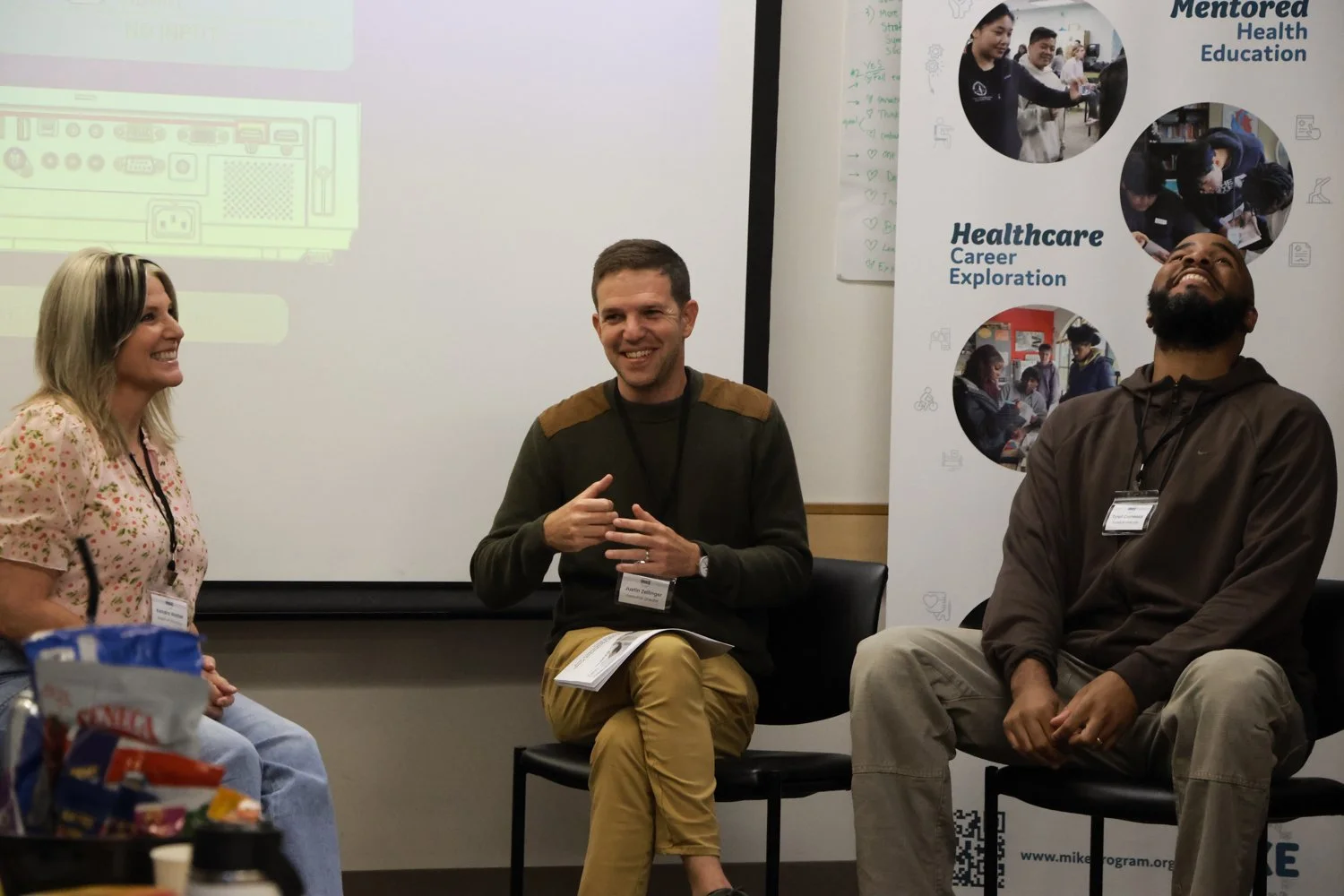 Kendra Wetter (on left) joins Justin Zellinger and Tyrell Comeaux for a role play in nonprofit development.