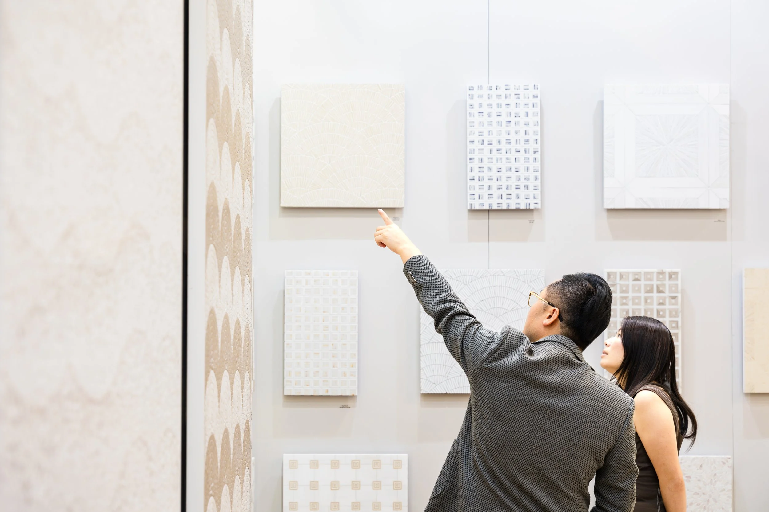 Couple exploring new products together at a design showcase event