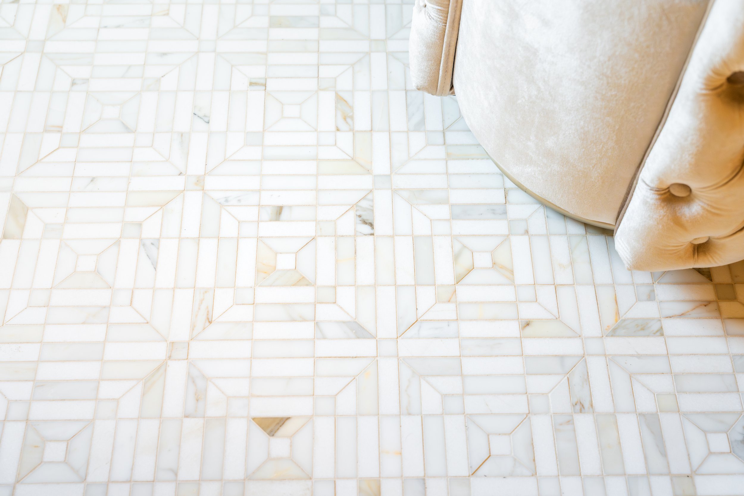 Close-up detail photo of a luxury home's bathroom marble floor