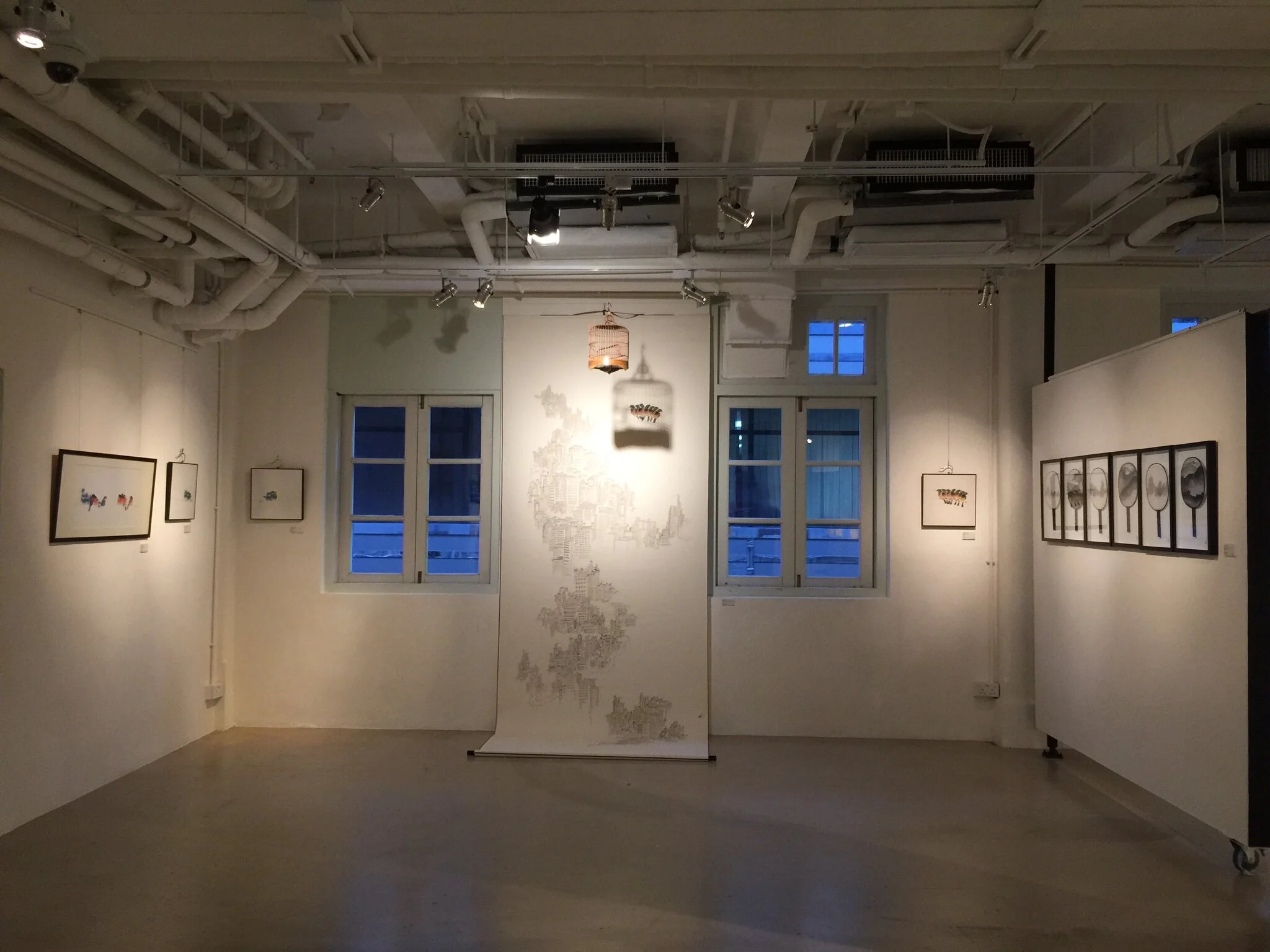  "Fifty Shades of INK" exhibition revolves around the concept of "consumption" and "displacement" which the artist concerns, through different mediums (paintings on paper, silk and canvas, plus installations) comprising the depiction and implication 