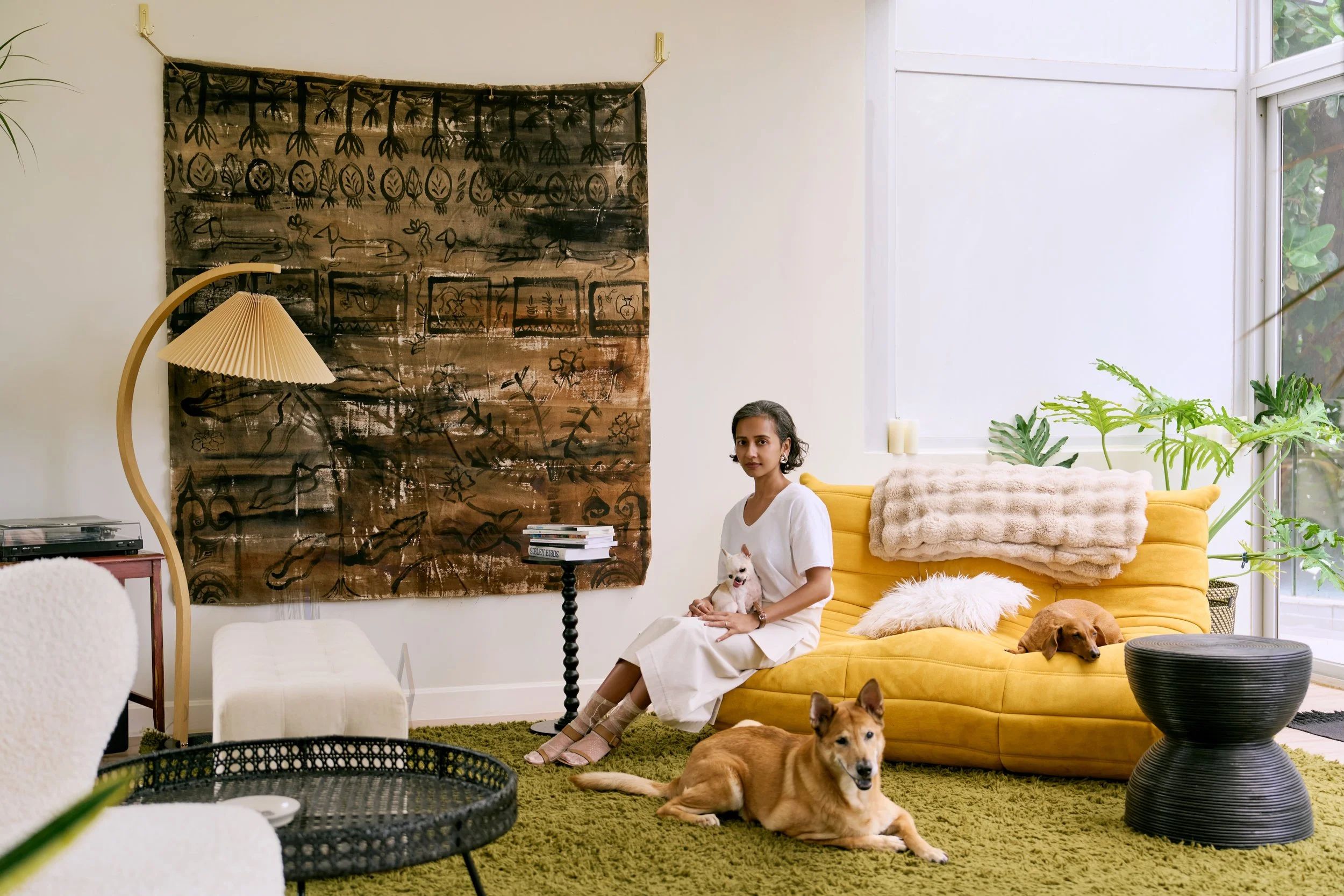2026 09 Sai Pradhan with dogs and art copy.jpg