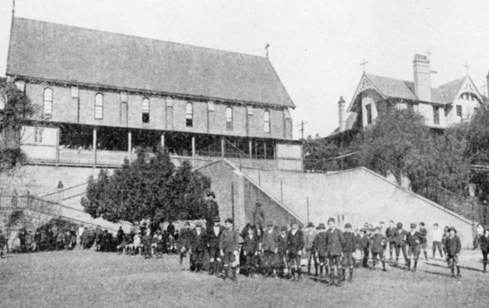  Students pose in front of the courts during a handball tournament, Christian Brothers’ College, Balmain, 1920s. Christian Brothers Archive, NSW