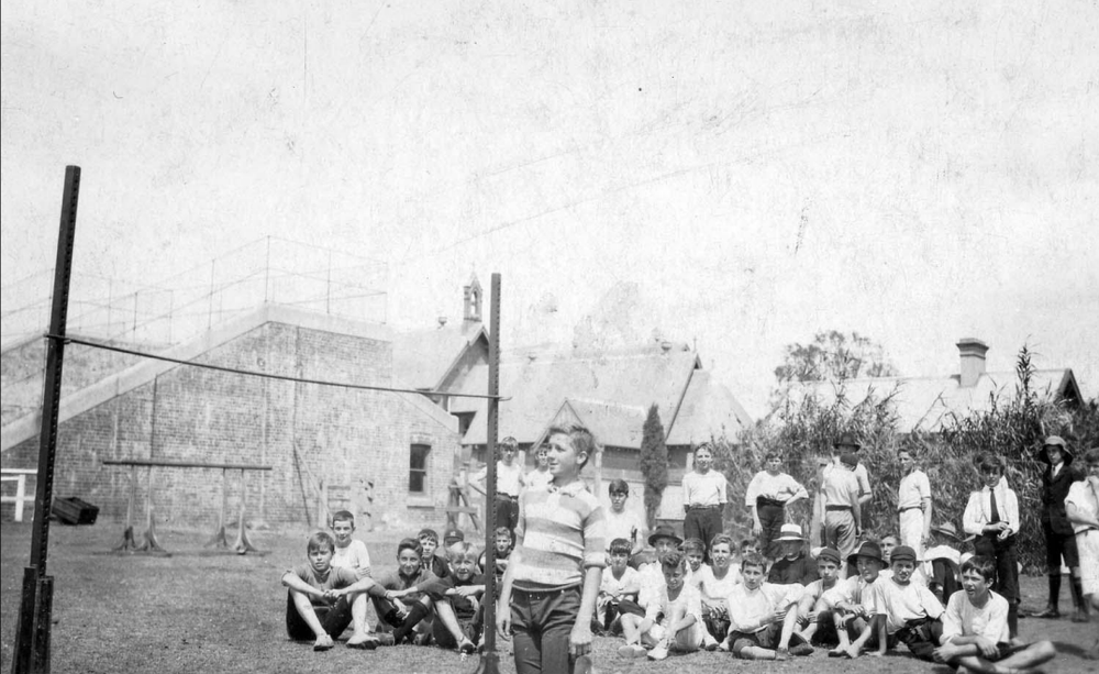 View of the handball courts at St Enda’s Juniorate, Strathfield, as students and Brothers spectate during a sports day, 1922/1923. Christian Brothers Archive, NSW