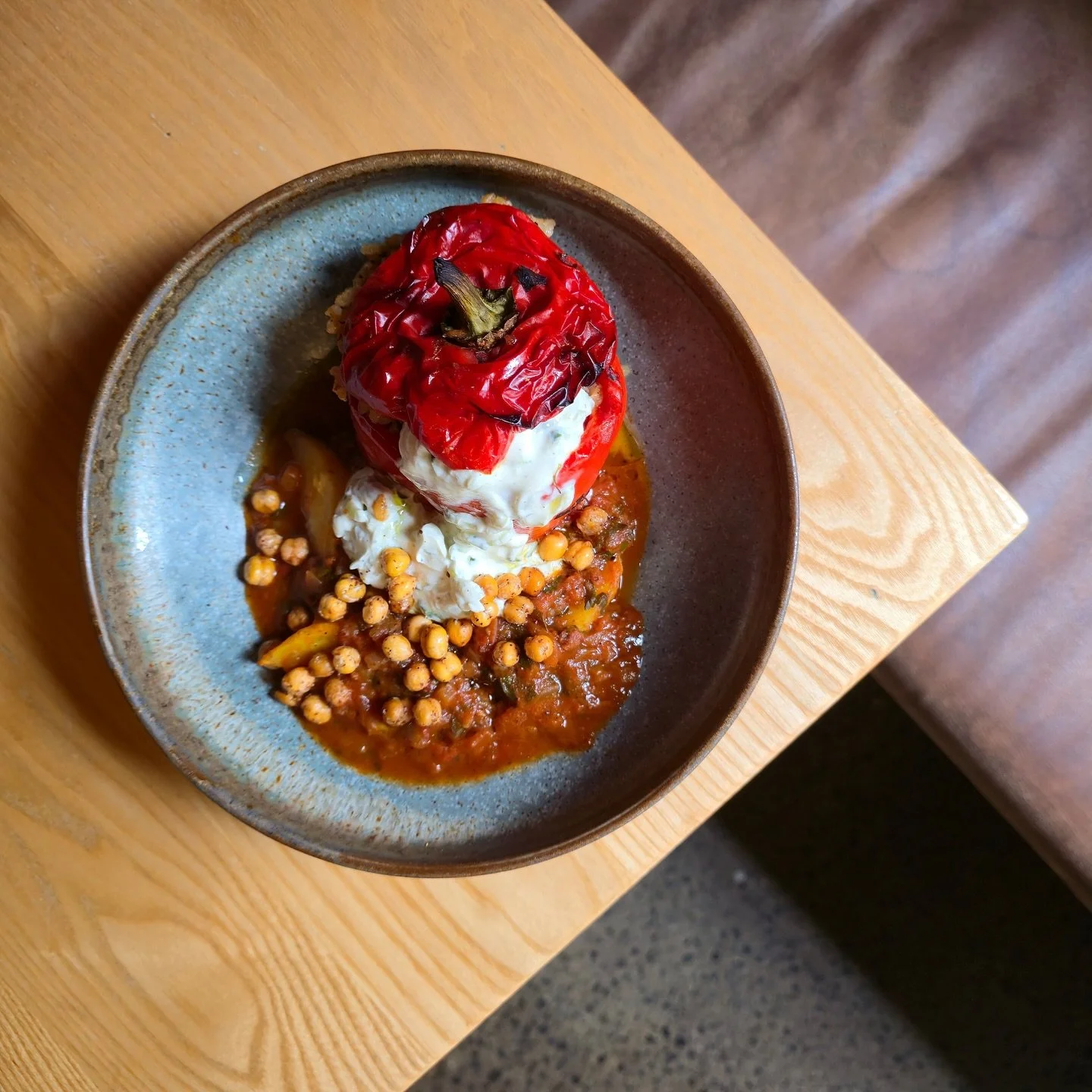 Heading to WOW this week? Come in and be WOWed beforehand with our new seasonal lunch menu that includes this delicious Gemista, stuffed bell pepper with rice, mint, dill, parsley and currants served with a cucumber tzatziki and crispy sumac chickpea