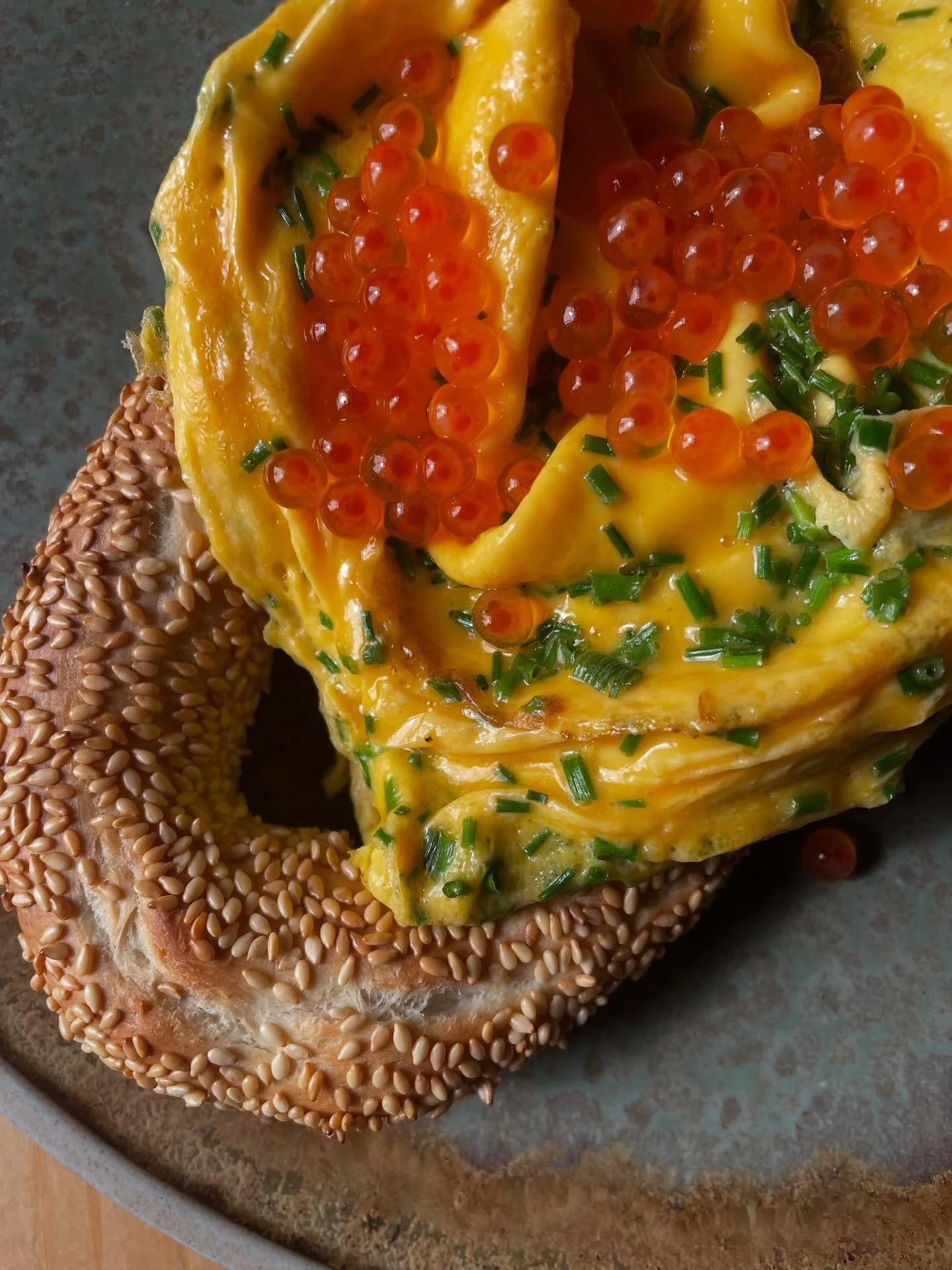 New on our menu salmon roe and soft scrambled eggs .

Salmon roe, chive soft scrambled eggs on koulouri.
On everyday from 7am