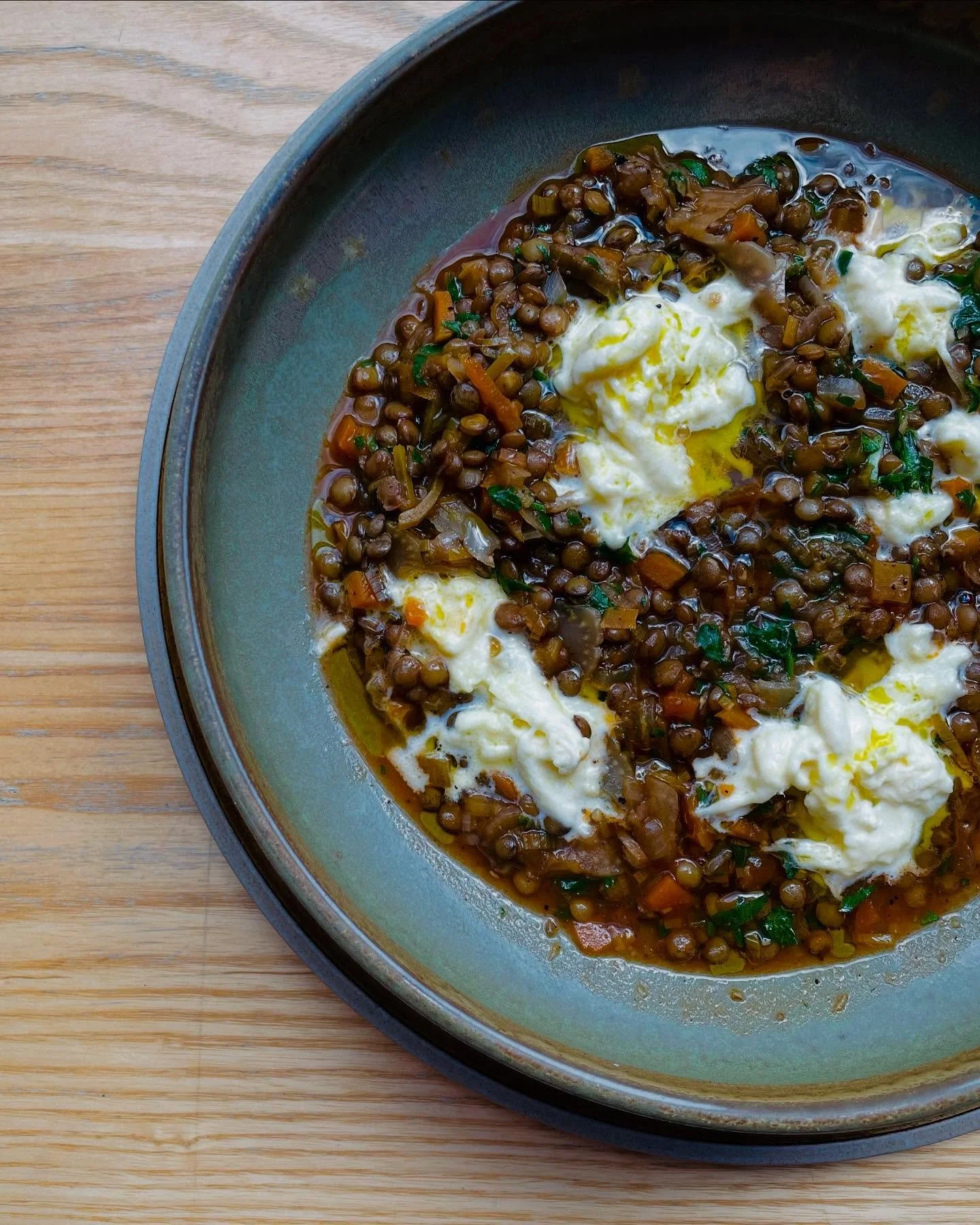 Fak&eacute;s, hearty vegetarian puy lentil stew served with stracciatella and sourdough. Served weekdays from 11:30am