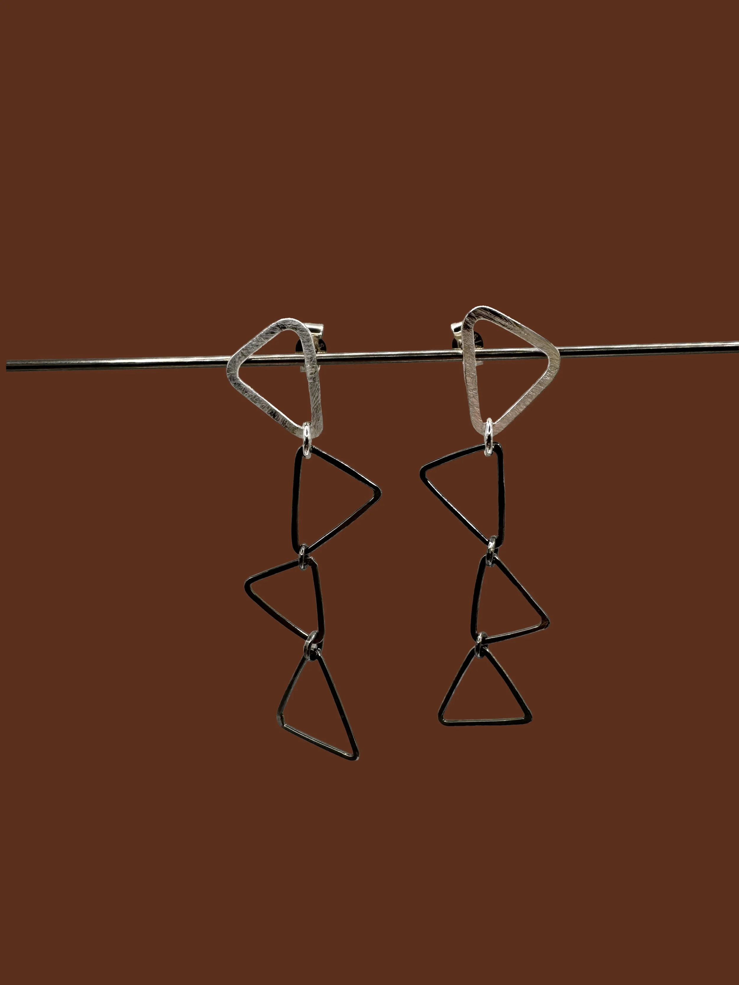 ox triangle earrings.jpg