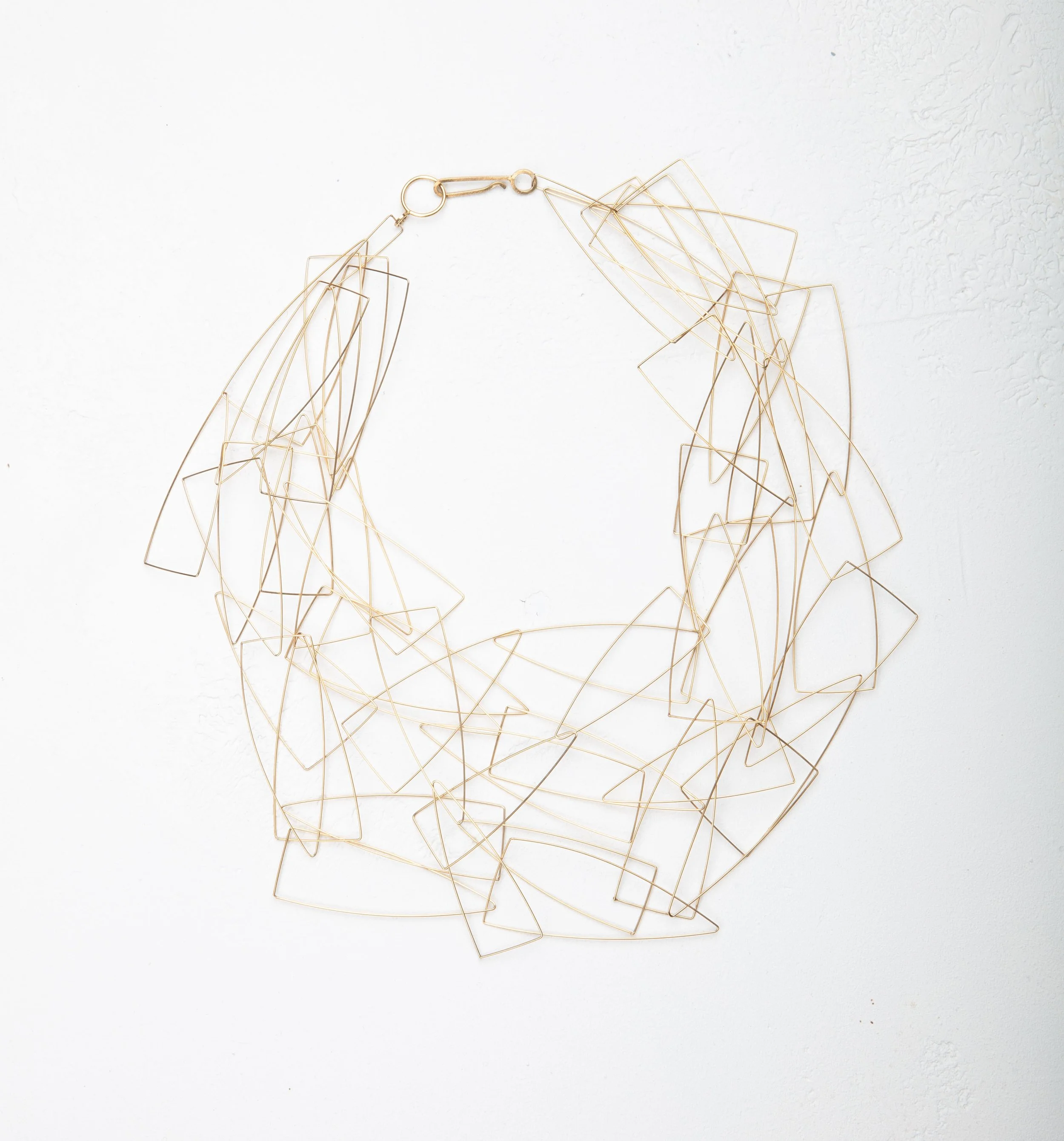 GOLD-NECKLACE-ON-WHITE.jpg