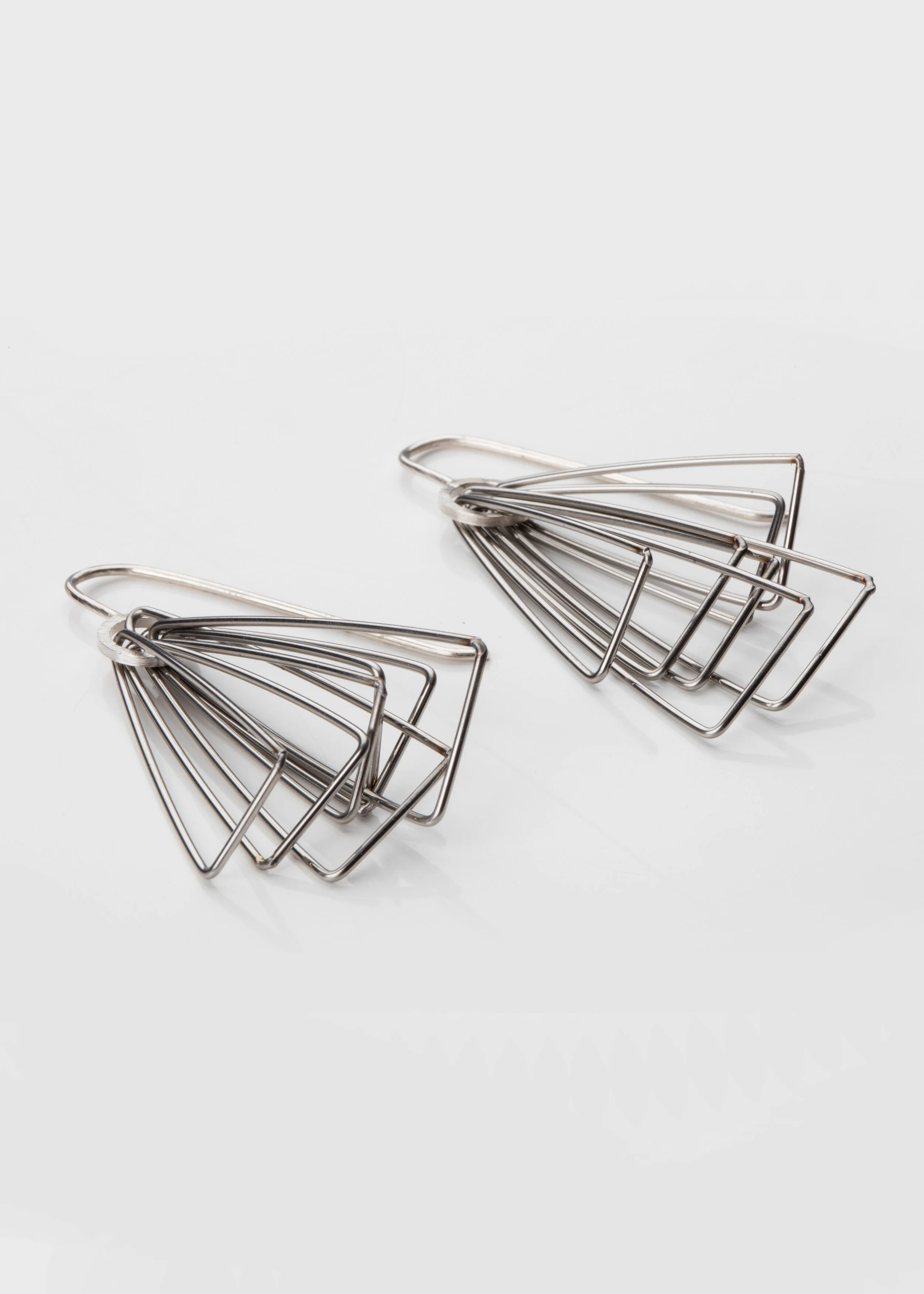 contemporary bespoke stainless steel silver triangle earrings handmade in Glasgow