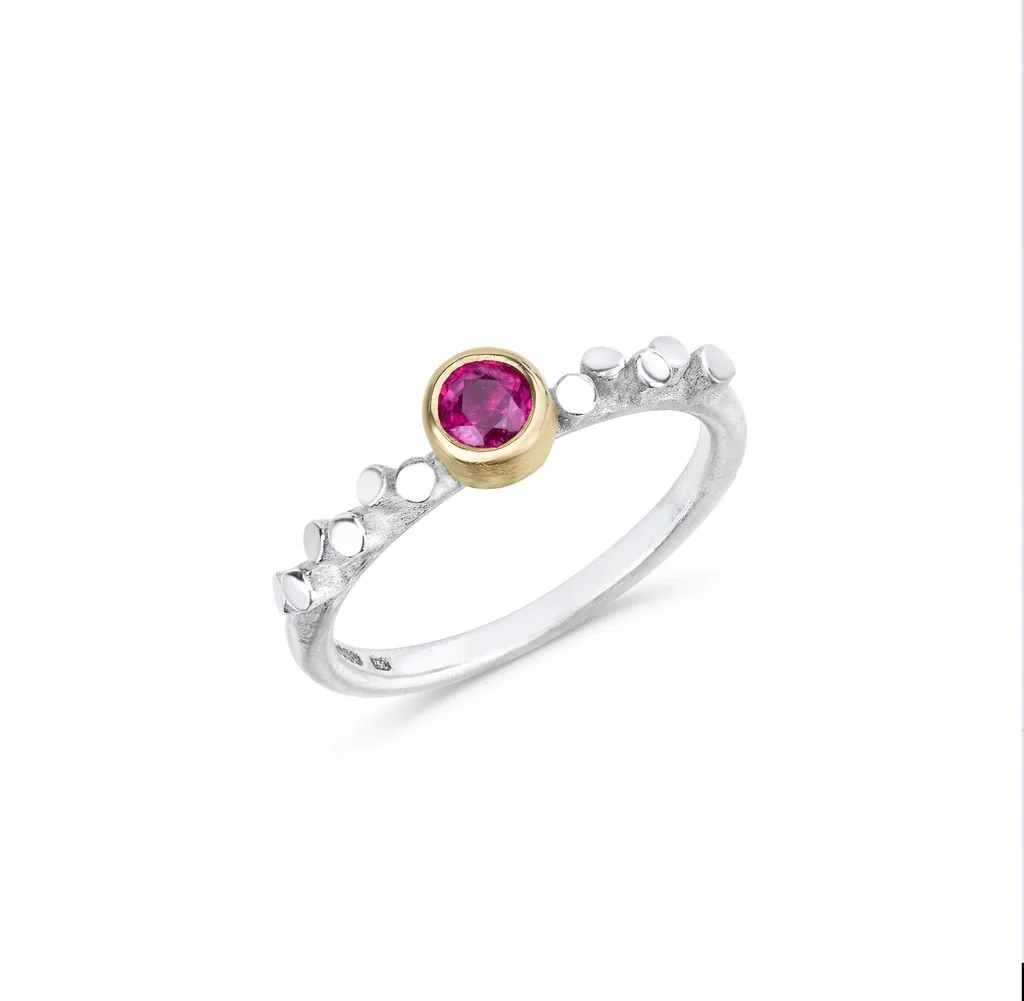Handmade sterling silver ring with a ruby, inspired by Skye’s shoreline barnacles. Contemporary coastal jewellery by Heather McDermott