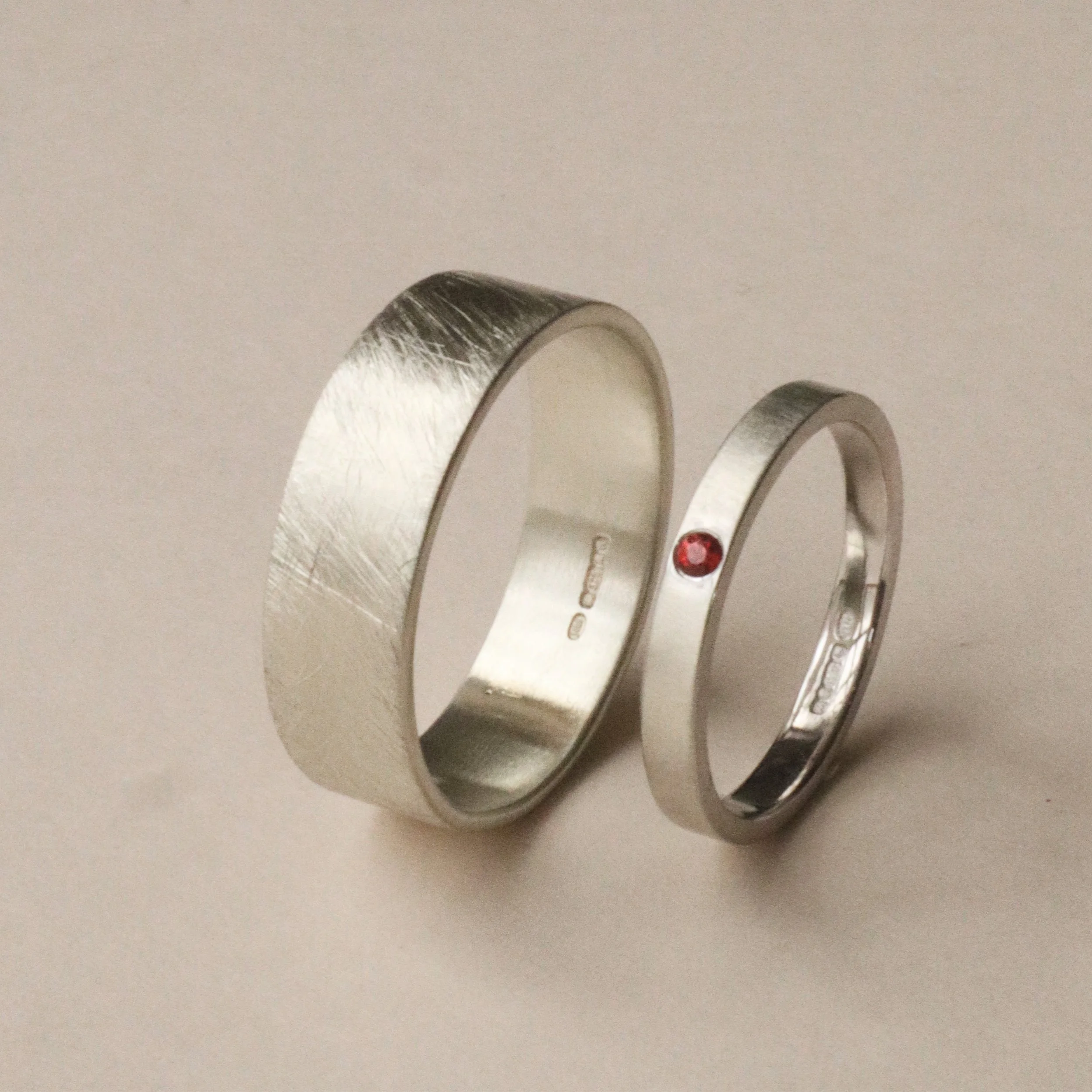 9ct white rings with a ruby set ring