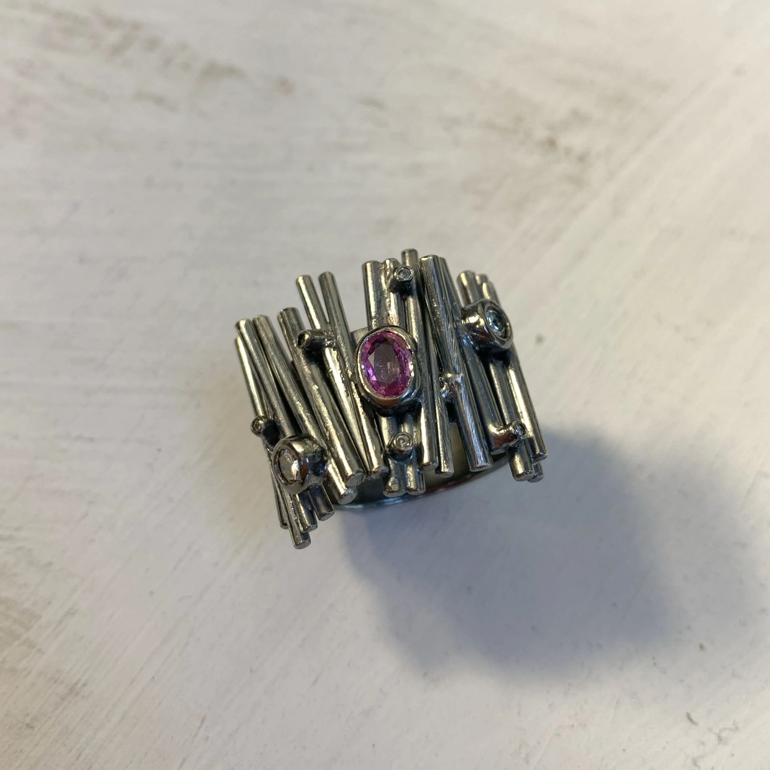 Ruby ring in oxidised silver and scattered diamonds
