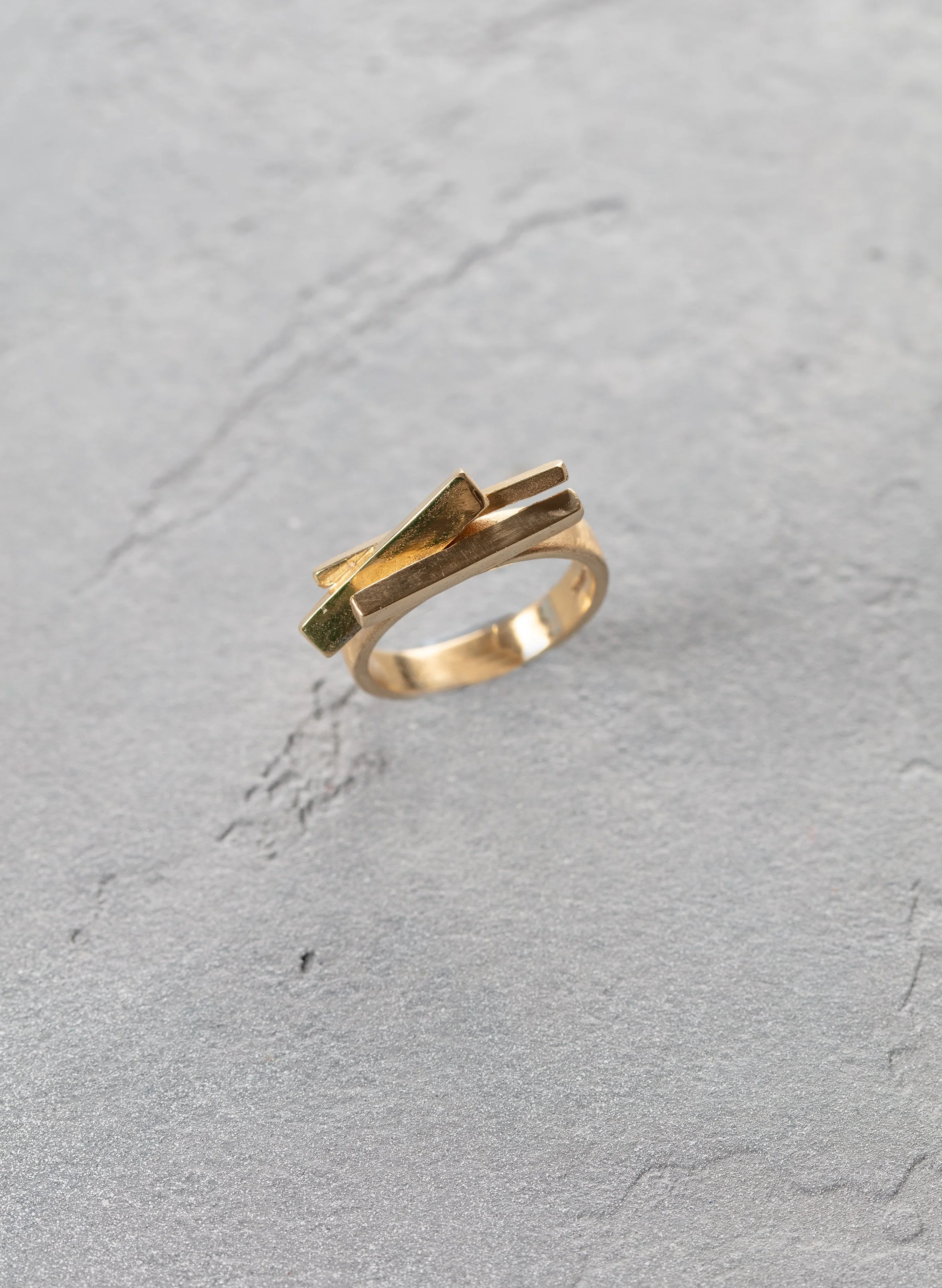 gold ring with three bars