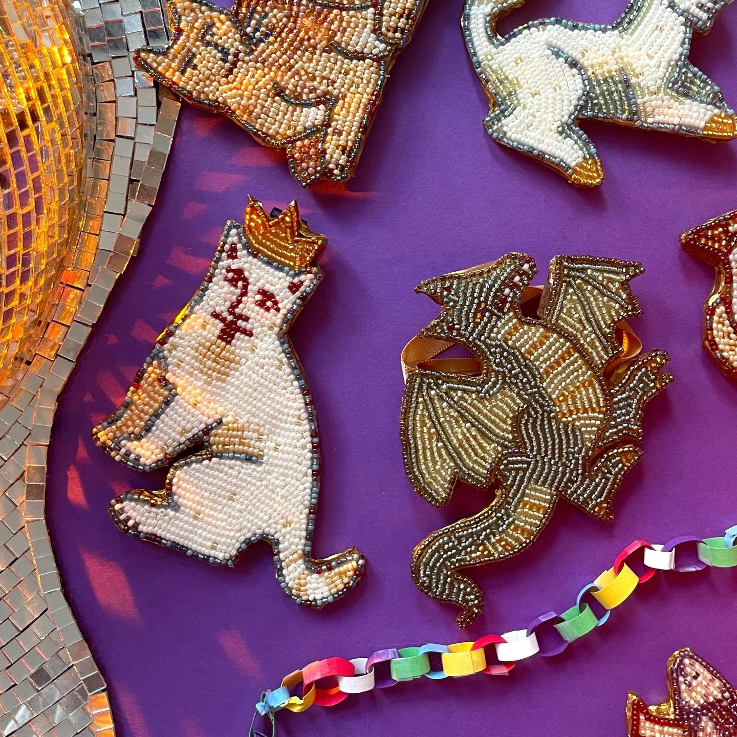 Uh oh&hellip; Your tree has been unhealthily low on Medieval beastie ornaments, and I&rsquo;m sooo happy to help you fix that 👹

These ornaments are handmade by me by applying glass beads one-by-one with a needle to a clay base. Like a teeny tiny mo