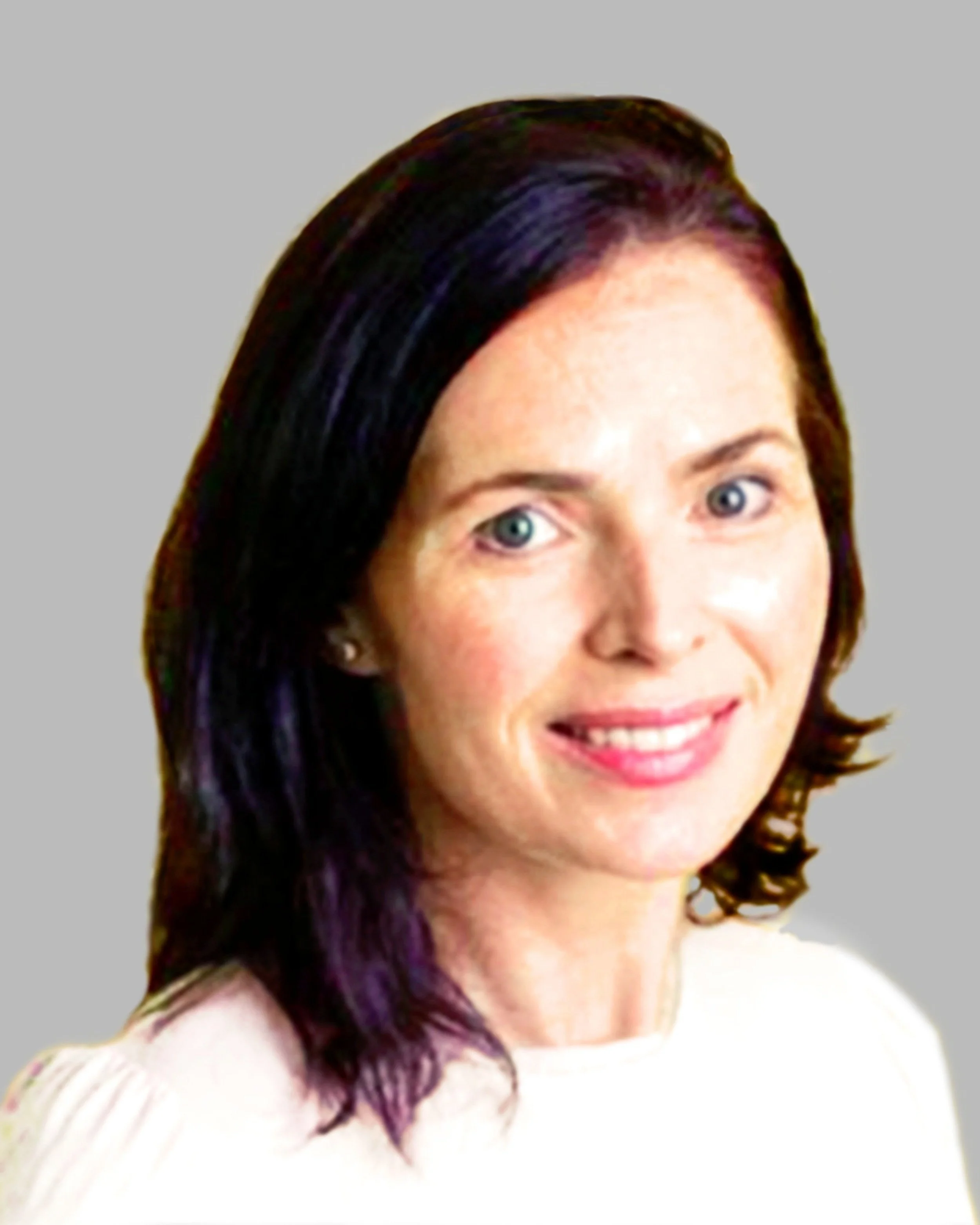 Portrait of a woman with shoulder-length dark hair, blue eyes, and pink lipstick, wearing a light-colored top, smiling against a plain background.