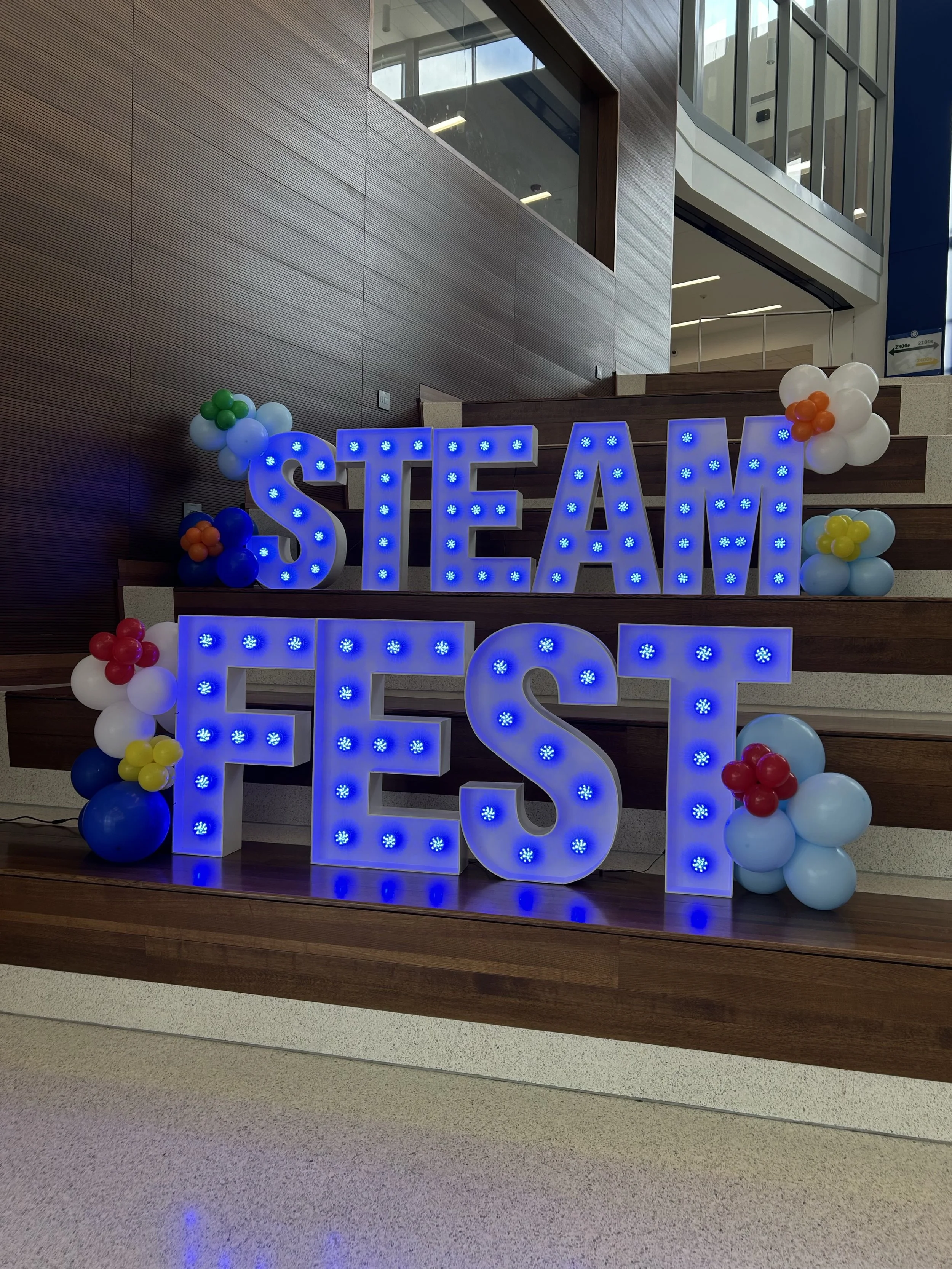 Lit Marquee Letters and Balloon Clusters in Clayton, Missouri