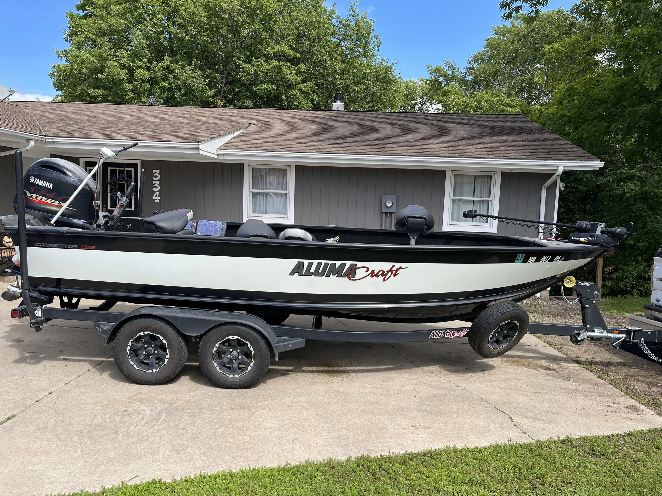 For Sale:2021 Alumacraft 205 Competitor Tiller with 150 Yamaha VMax SHO, Uflex Steering, Shorelandr bunk trailer. Boat comes with wavewackers, 36 volt Minnkota Riptide Transom Mount, 5 batteries,  HELIX 12 CHIRP MEGA SI+ GPS, 3 bank Minnkota onboard
