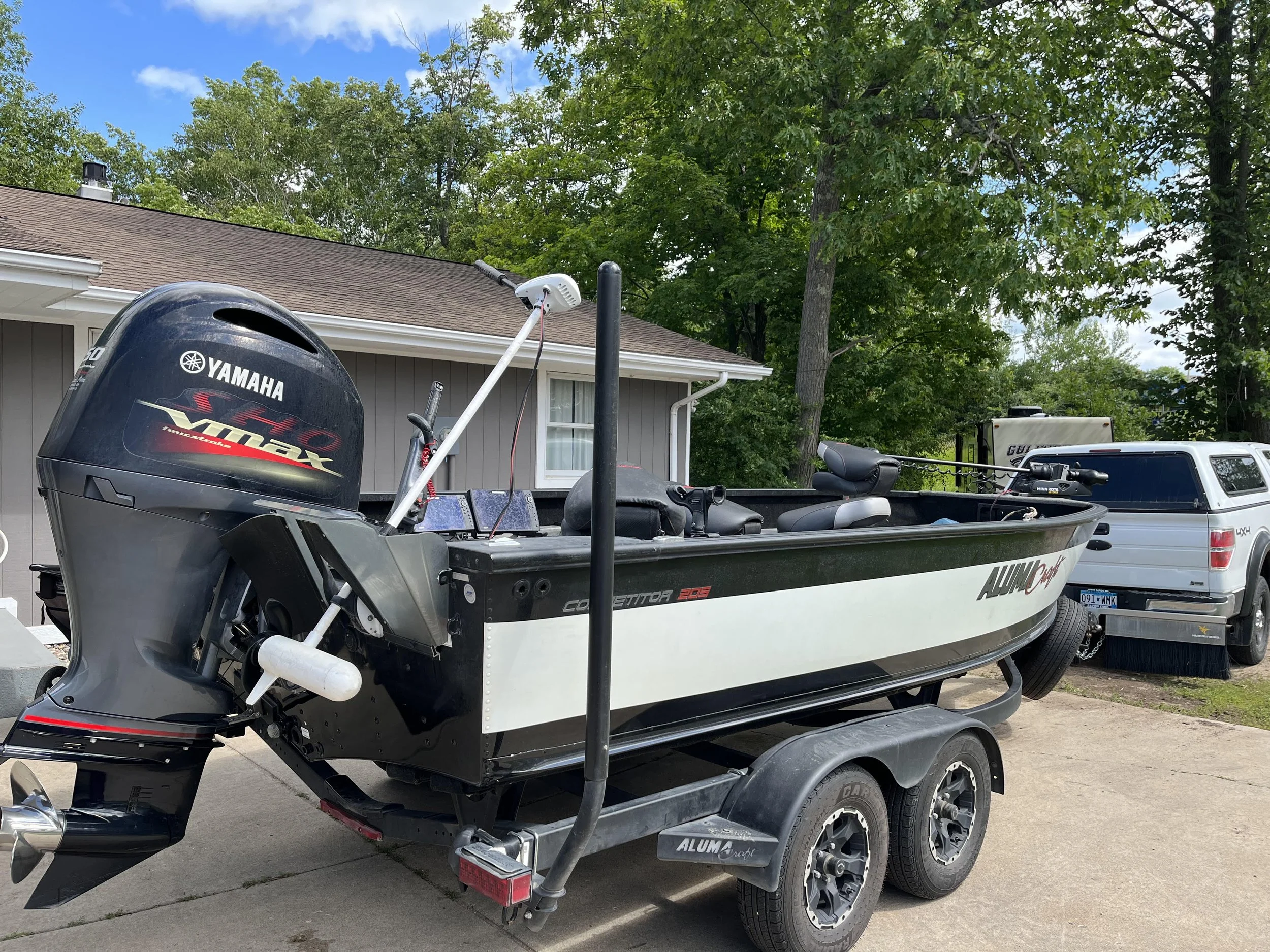 For Sale:2021 Alumacraft 205 Competitor Tiller with 150 Yamaha VMax SHO, Uflex Steering, Shorelandr bunk trailer. Boat comes with wavewackers, 36 volt Minnkota Riptide Transom Mount, 5 batteries,  HELIX 12 CHIRP MEGA SI+ GPS, 3 bank Minnkota onboard