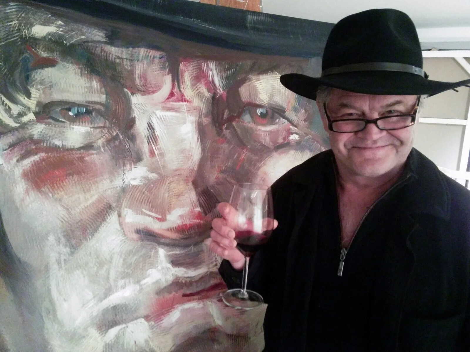 Micky Dolenz next to his portrait in Zhenya's studio
