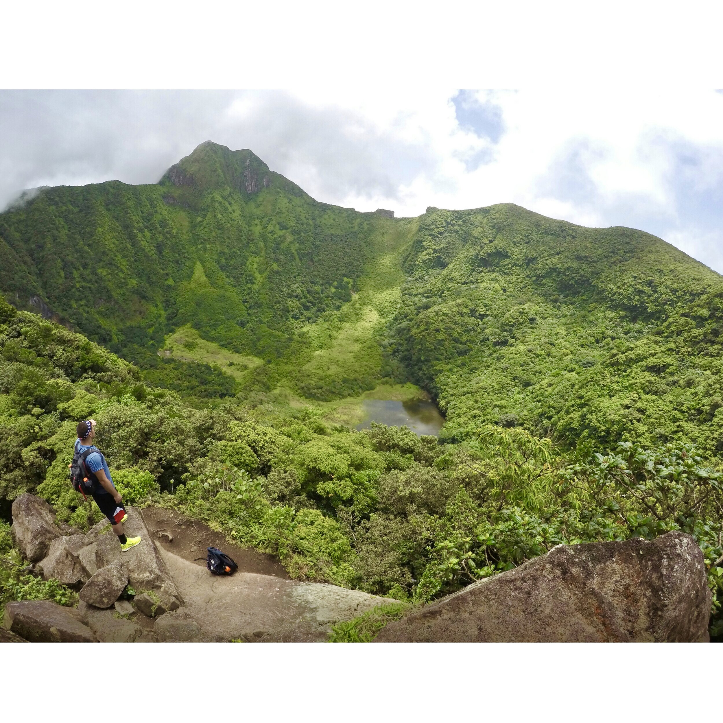 Peering into the crater of Mt. Liamuiga in St. Kitts, an 8-hour hike up and into a dormant volcano that nearly killed me.