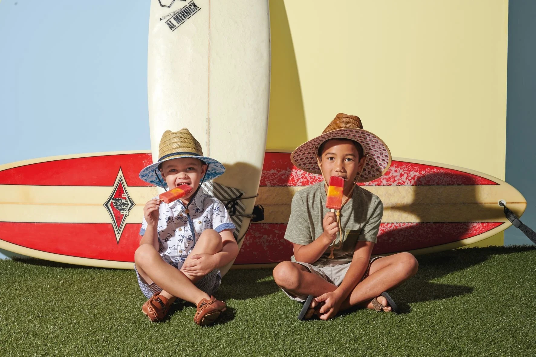 On set for a lifestyle shoot with two kid models wearing San Diego Hat Company. Shoot is at Pacific Plus Studios. 