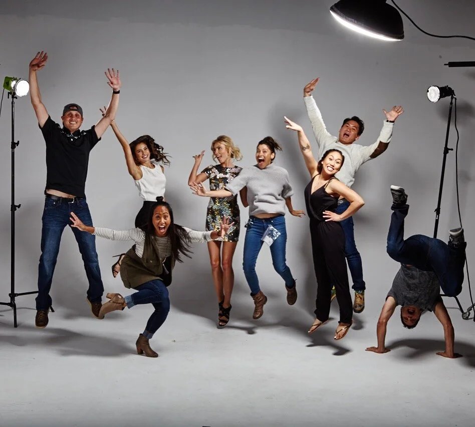 That's a wrap photo after a lifestyle shoot at Pacific Plus Studios. The shoot team consists of a photographer, two models, a wardrobe stylist, creative director, project manager, hair and makeup artist and brand owner. 