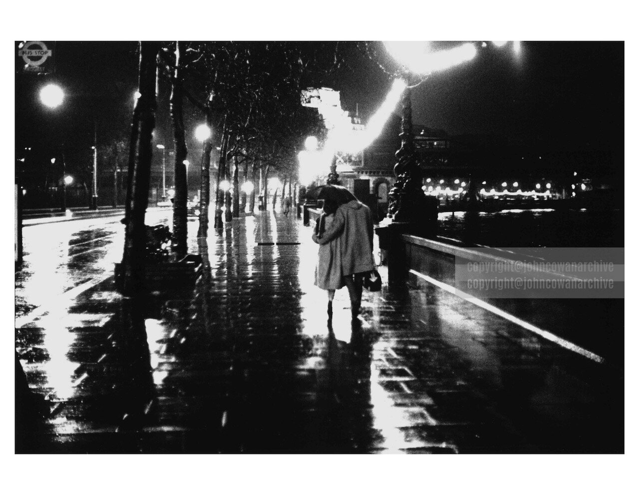 'Couple Walking in the Rain by the Thames'