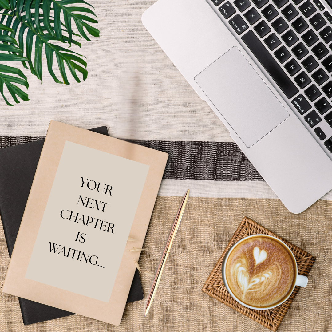 A workspace with a laptop, a notebook with a message saying 'YOUR NEXT CHAPTER IS WAITING...', a gold pen, a cup of coffee with latte art, a woven coaster, a black book underneath the notepad, and a green plant on a beige and striped fabric surface.