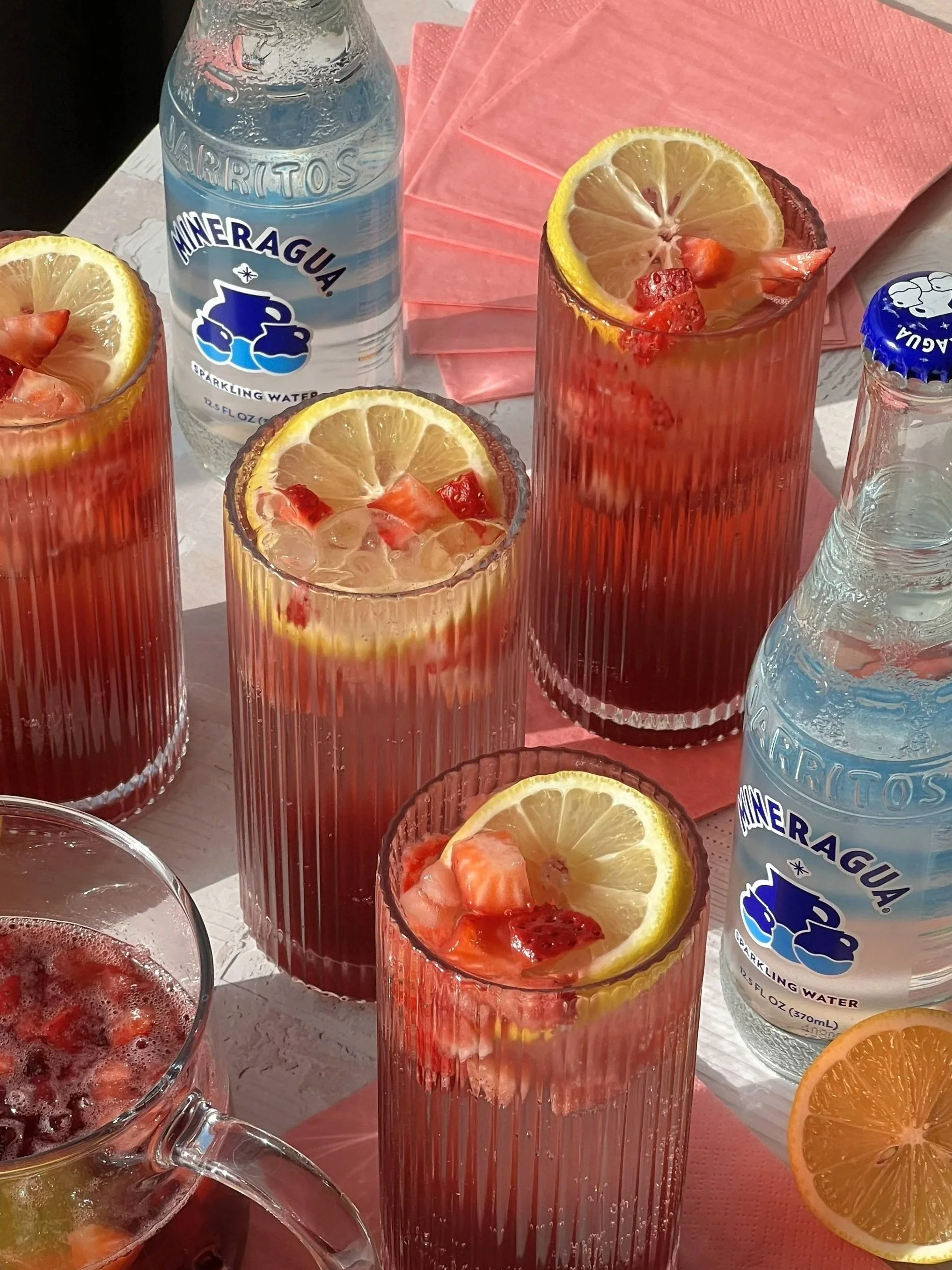 This fruity, sparkle-filled batched punch for Galentine's Day showed that Mineragua is even better shared 