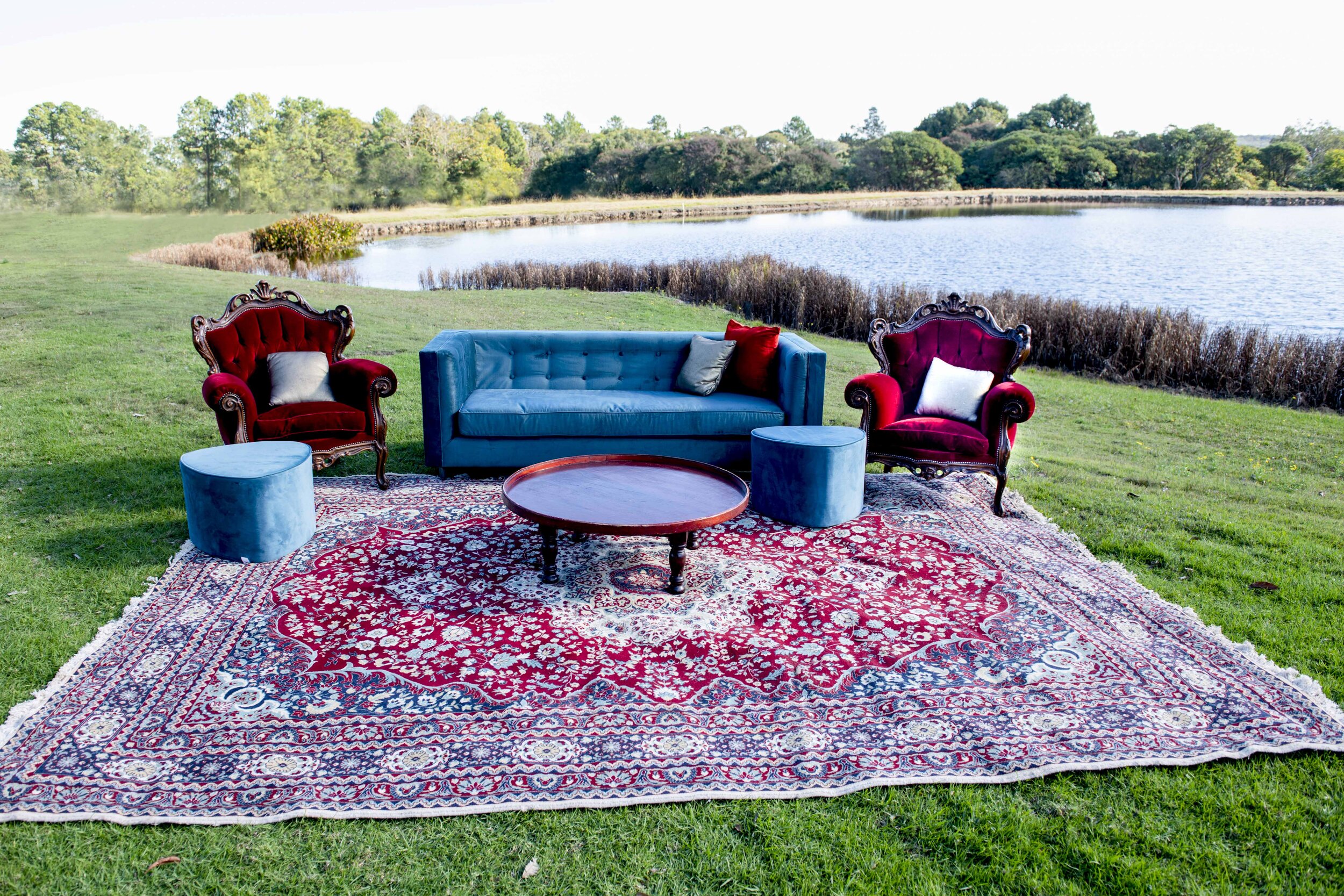 Blue Velvet 3 seater couch $150 Blue Velvet Ottomons $35 4 available Persian Rugs $75