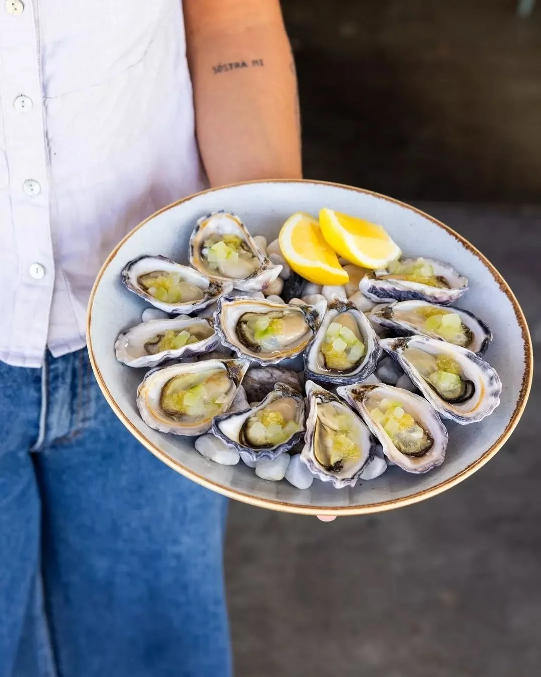 Beautiful Albany Rock Oysters with finger lime and pickled cucumber 🦪