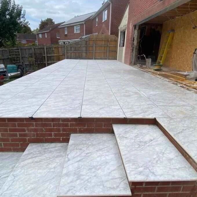 🟠 Patio Update in Glastonbury 🟠

The raised patio area in Glastonbury is now finished 💪

Finished with a porcelain slab, we think this looks amazing 🤩. I'm sure friends will be envious when invited around for drinks or a BBQ 🍔🌭🍻

Big thanks to
