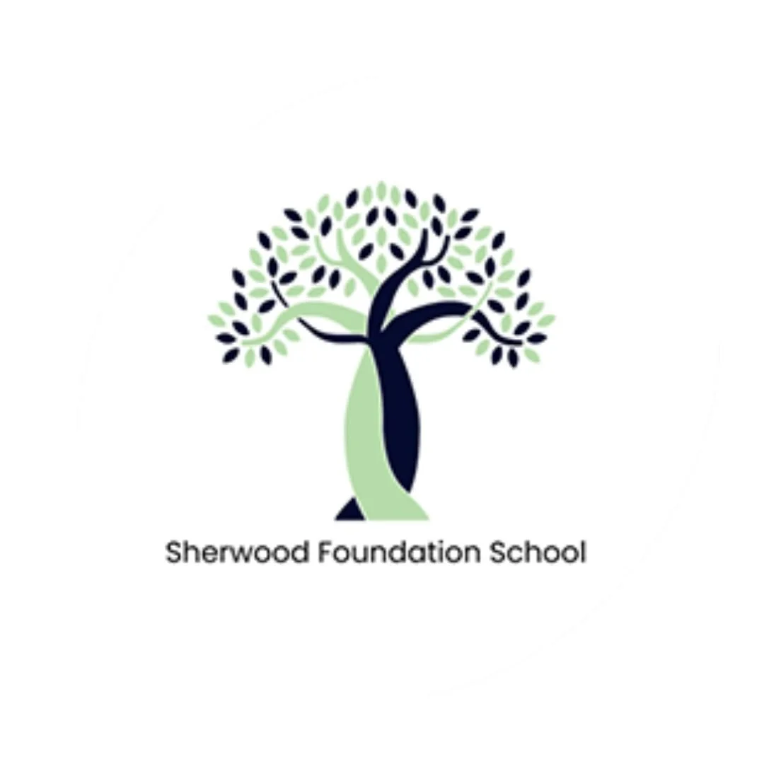 Logo of the Sherwood Foundation School featuring a stylized tree with green and dark blue leaves and trunk, with the school's name below.
