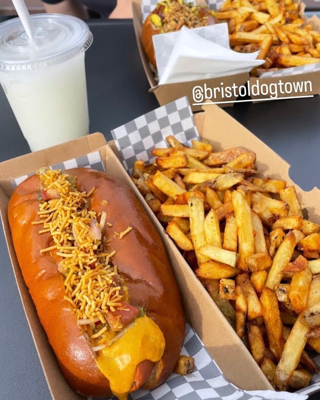 Vegan Ruby dog, fries and slushy photographed by @macaroni.the.saluki once upon  a time when the sun was shining and the dogs were slingin&rsquo; 🌭🍟🥤🐶

#wappingwharfbristol #wappingwharf #bristol #bristoleats #bristolfastfood #hotdoglovers #brist