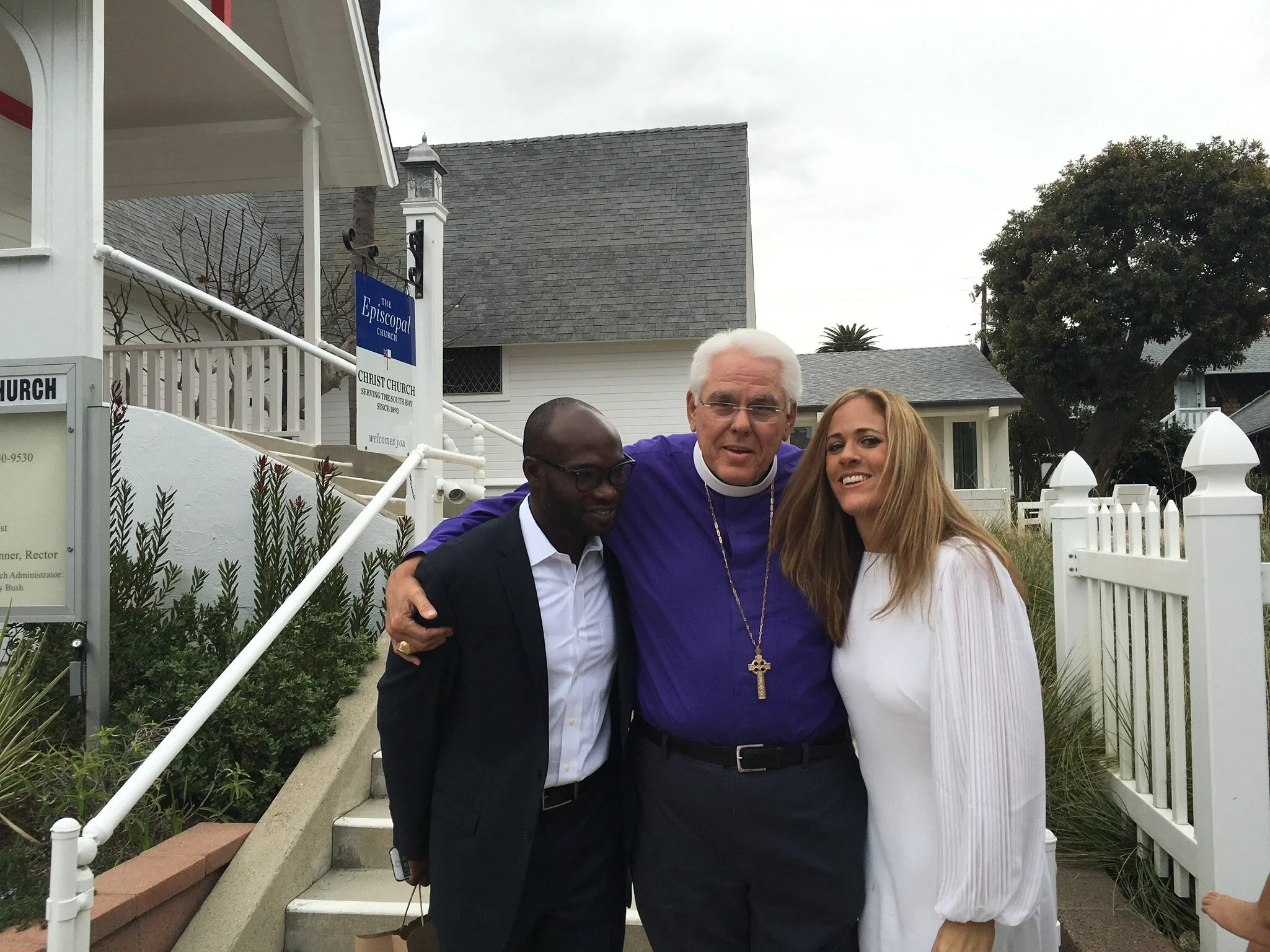 Rt. Rev. J Jon Bruno with the Dwomohs 