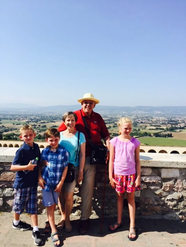 Jon Bruno with his wife Mary and grandchildren in Italy