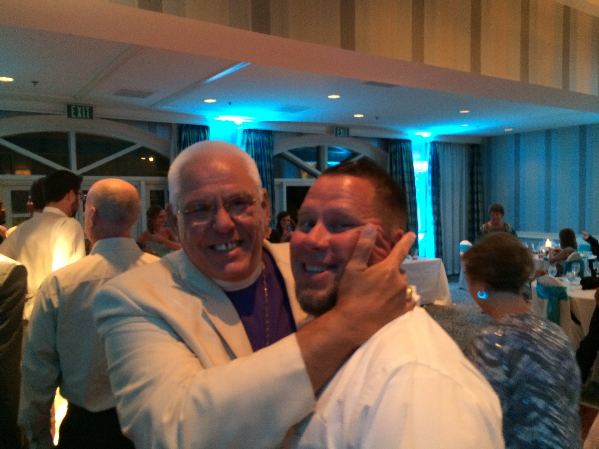 Rt. Rev. J Jon Bruno goofing around with his nephew Neil at a family wedding