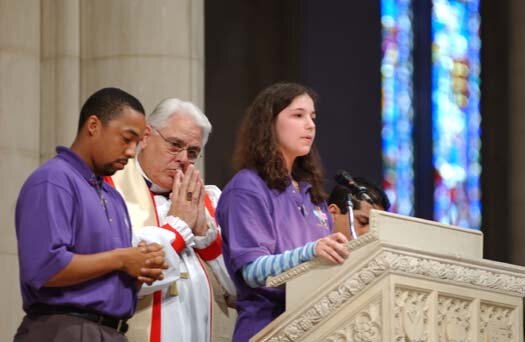 Rt. Rev. J Jon Bruno with members of the Hands in Healing group speaking at the National Cathedral in Washington DC