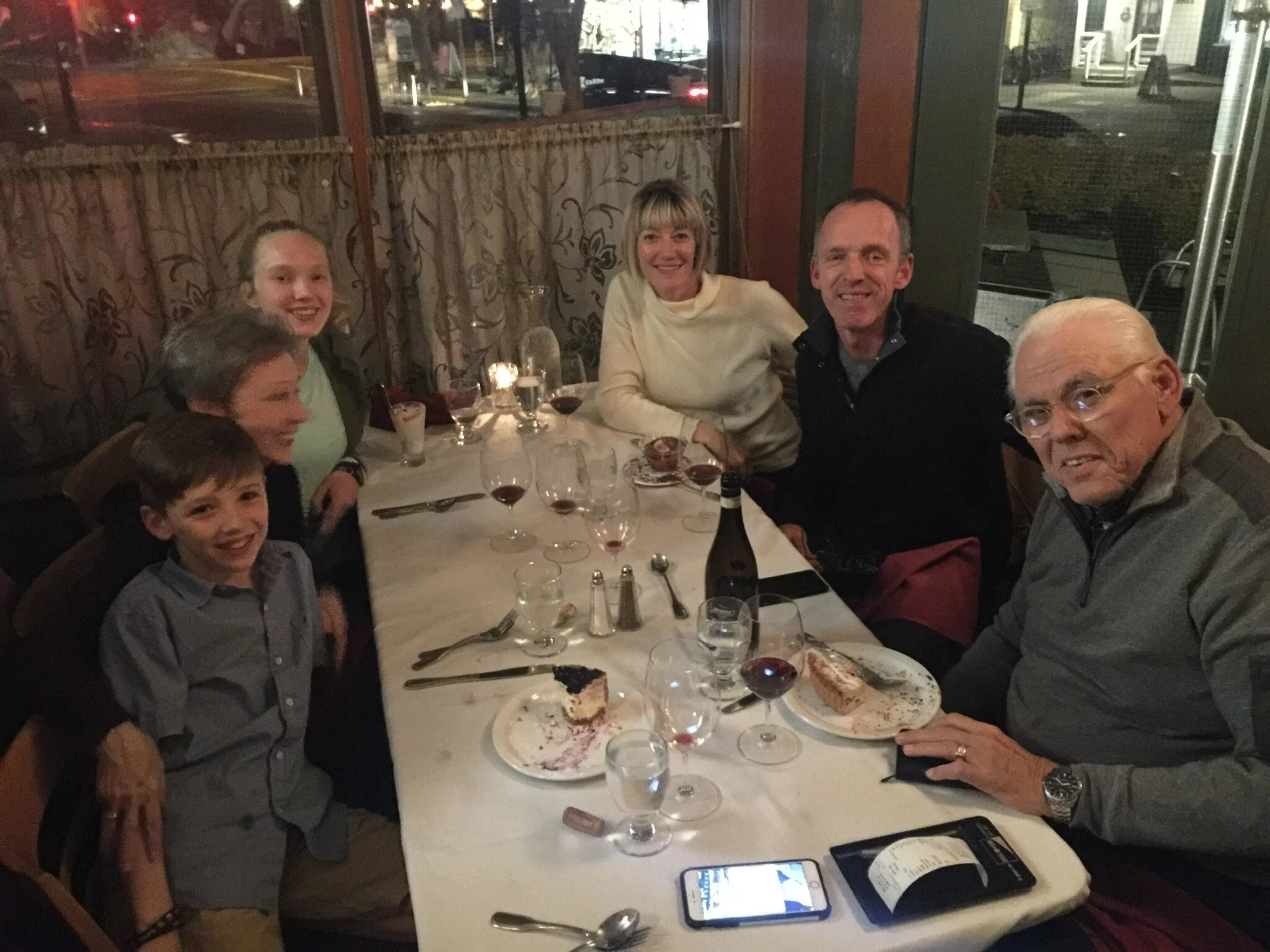 J Jon Bruno enjoying a meal with family