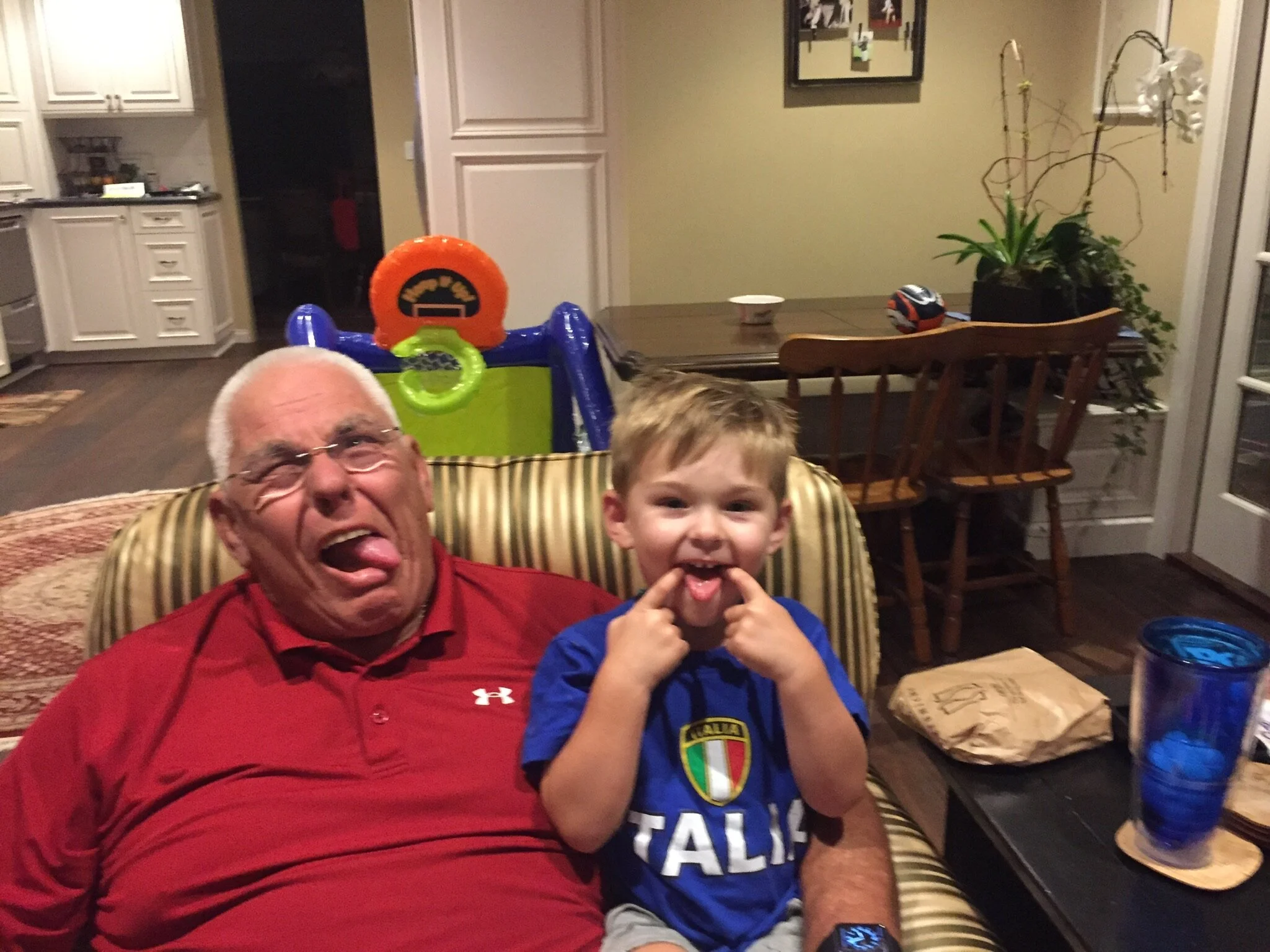 J Jon Bruno being silly with his grandson