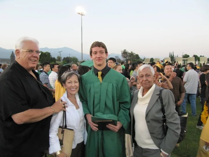 J Jon Bruno with his wife and sister at his grandson's graduation